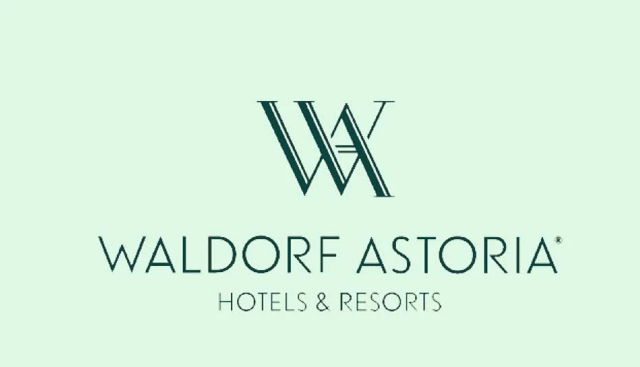 Waldorf Astoria Hotels & Resorts logo on a light green background.