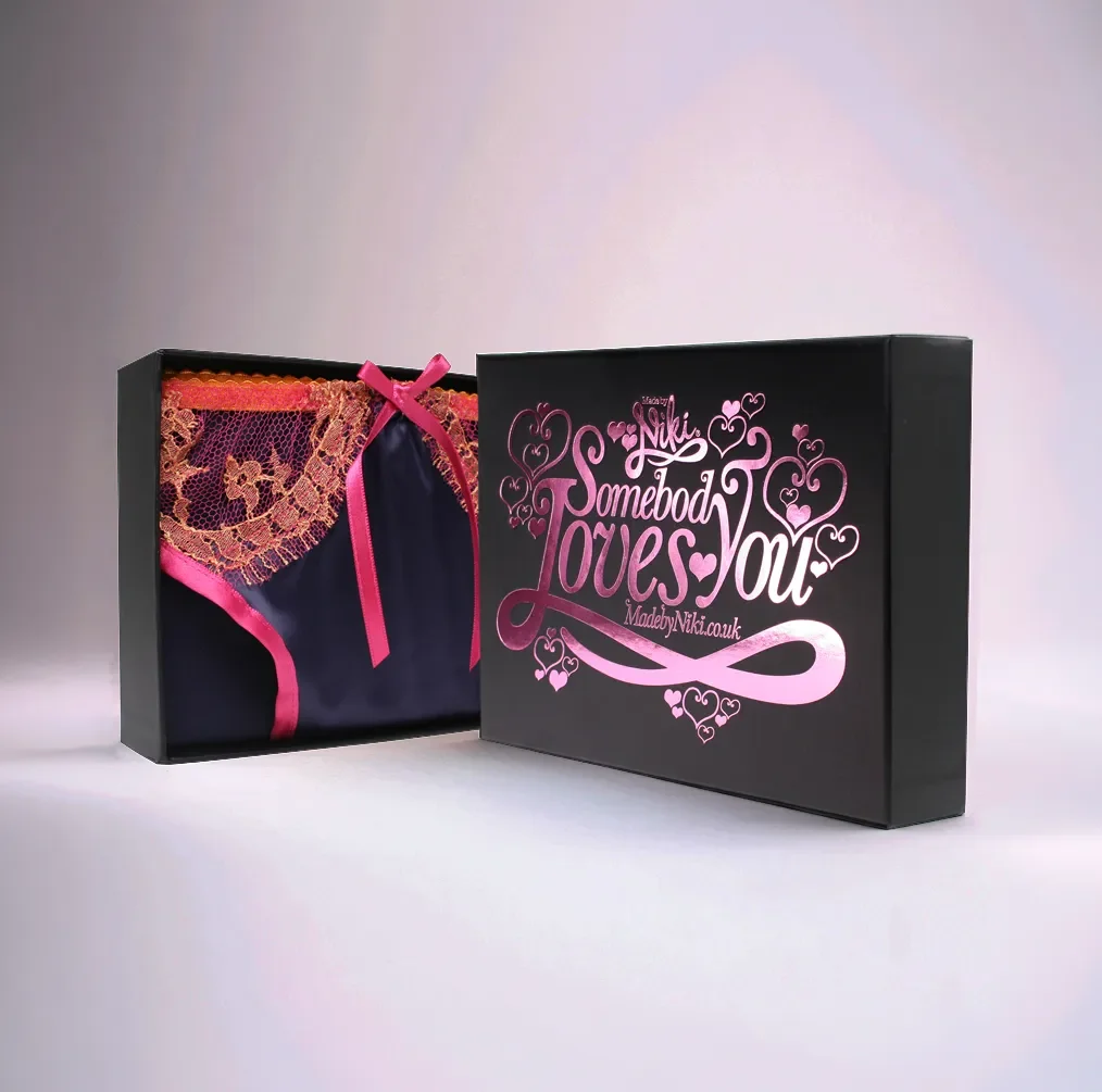 Hidden delights concealed beneath false bottom in Scott Parker's packaging design
