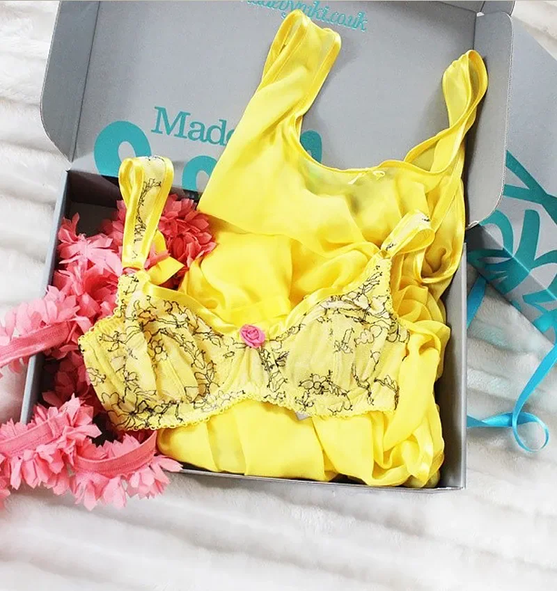 Influencer share of luxury lingerie packaging on social media after unboxing