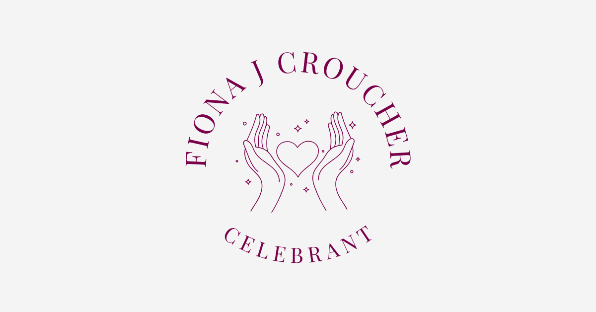 Logo for Fiona J Croucher Celebrant featuring two stylized hands forming a heart surrounded by small star-like sparkles, with the name "Fiona J Croucher" curved above and the word "Celebrant" below.