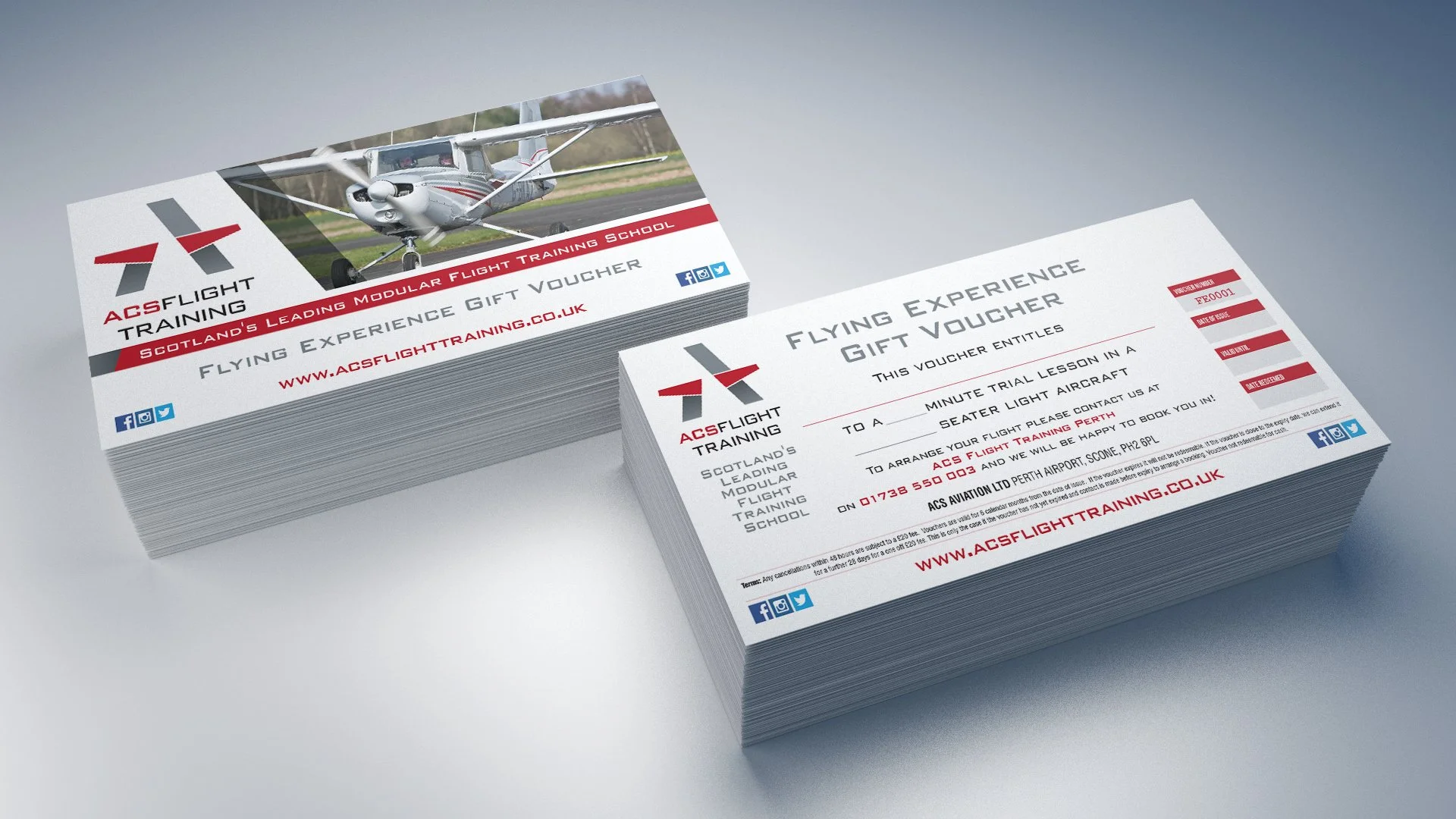 Stacks of flying experience gift vouchers from ACS Flight Training, featuring a small airplane on the front, with red and black text and social media icons.