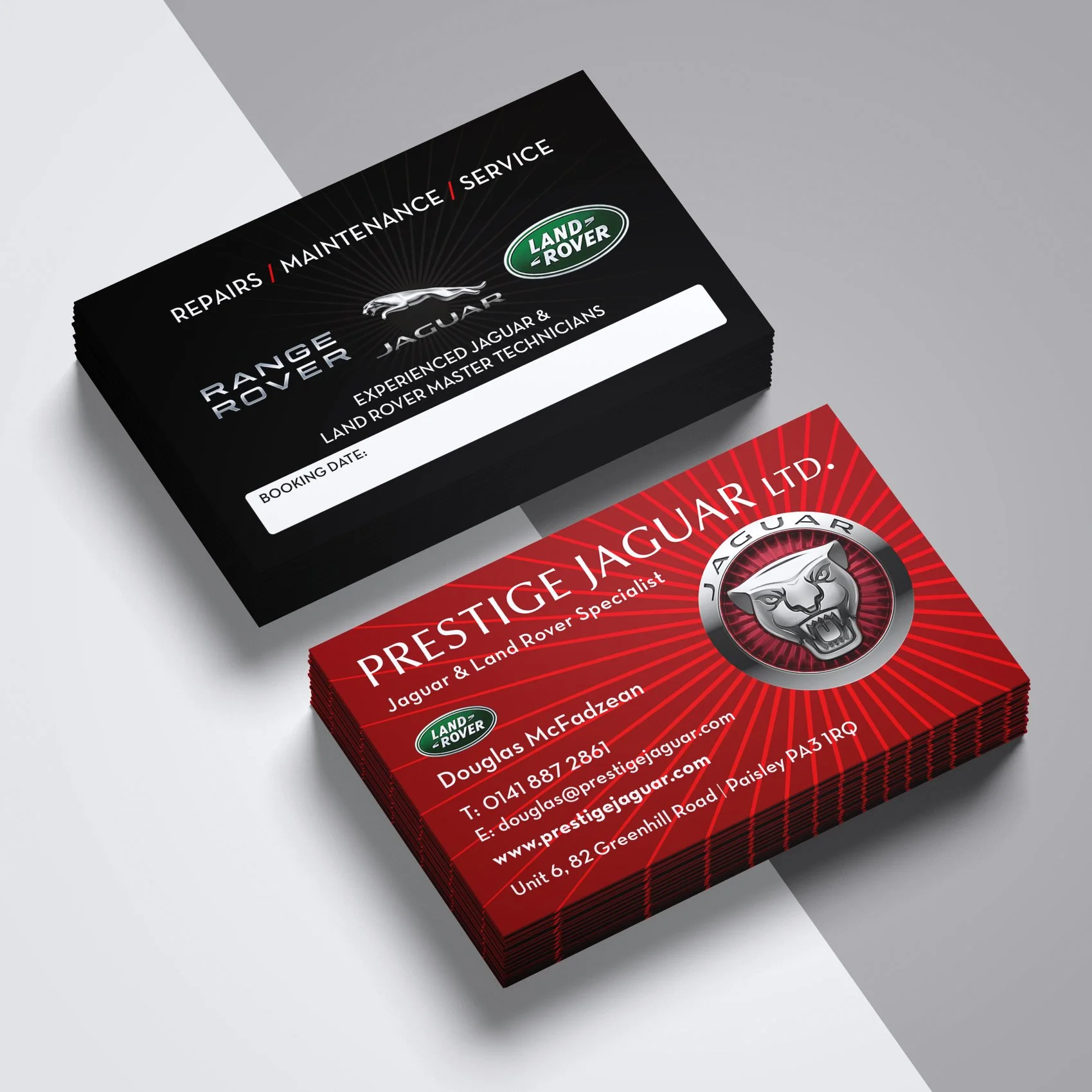 Stack of business cards for Prestige Jaguar Ltd. with red and black designs, featuring Jaguar logo, contact information, and tagline.