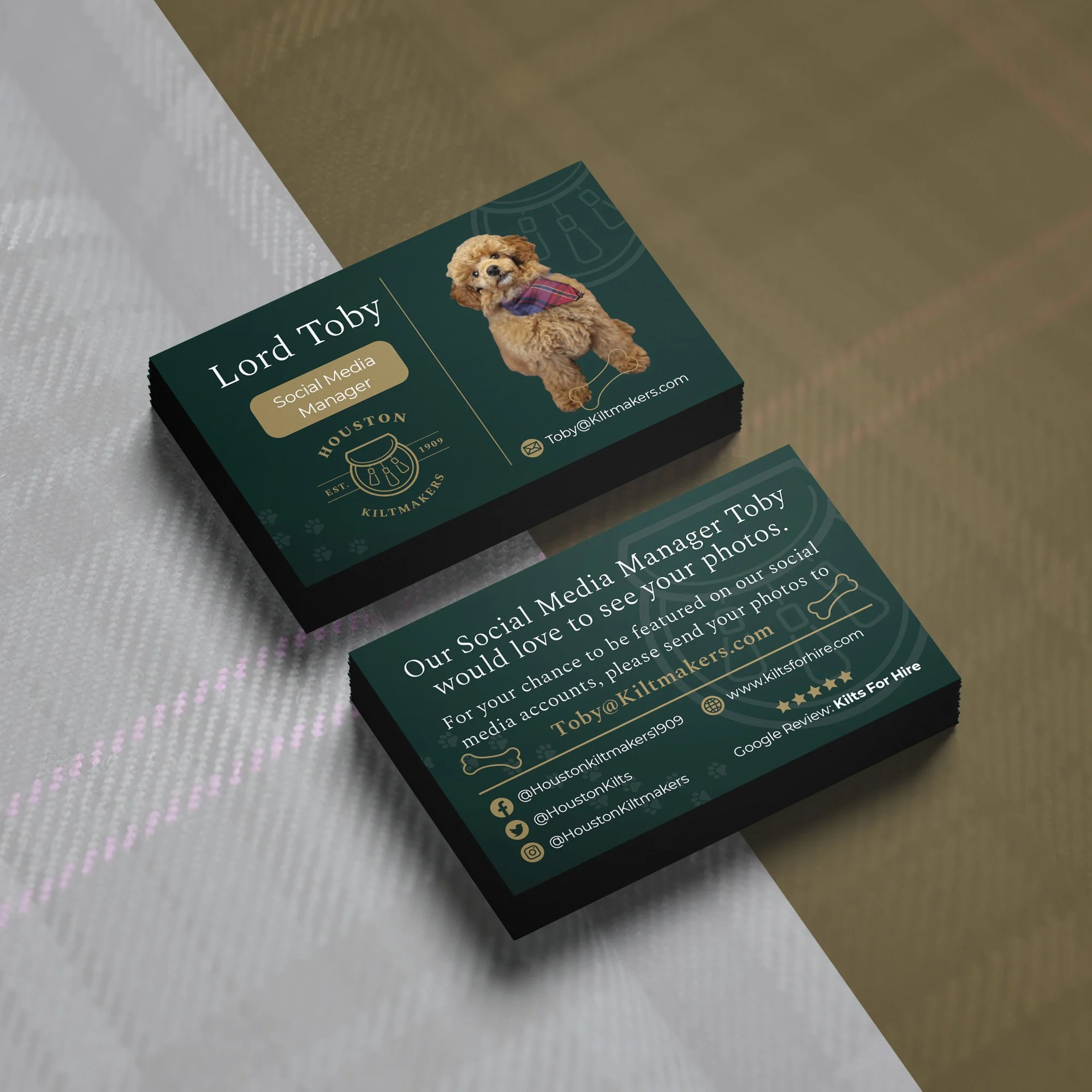 Business cards for Lord Toby, a social media manager, featuring a photo of a small, fluffy dog wearing a plaid bandana, with contact details and social media icons.