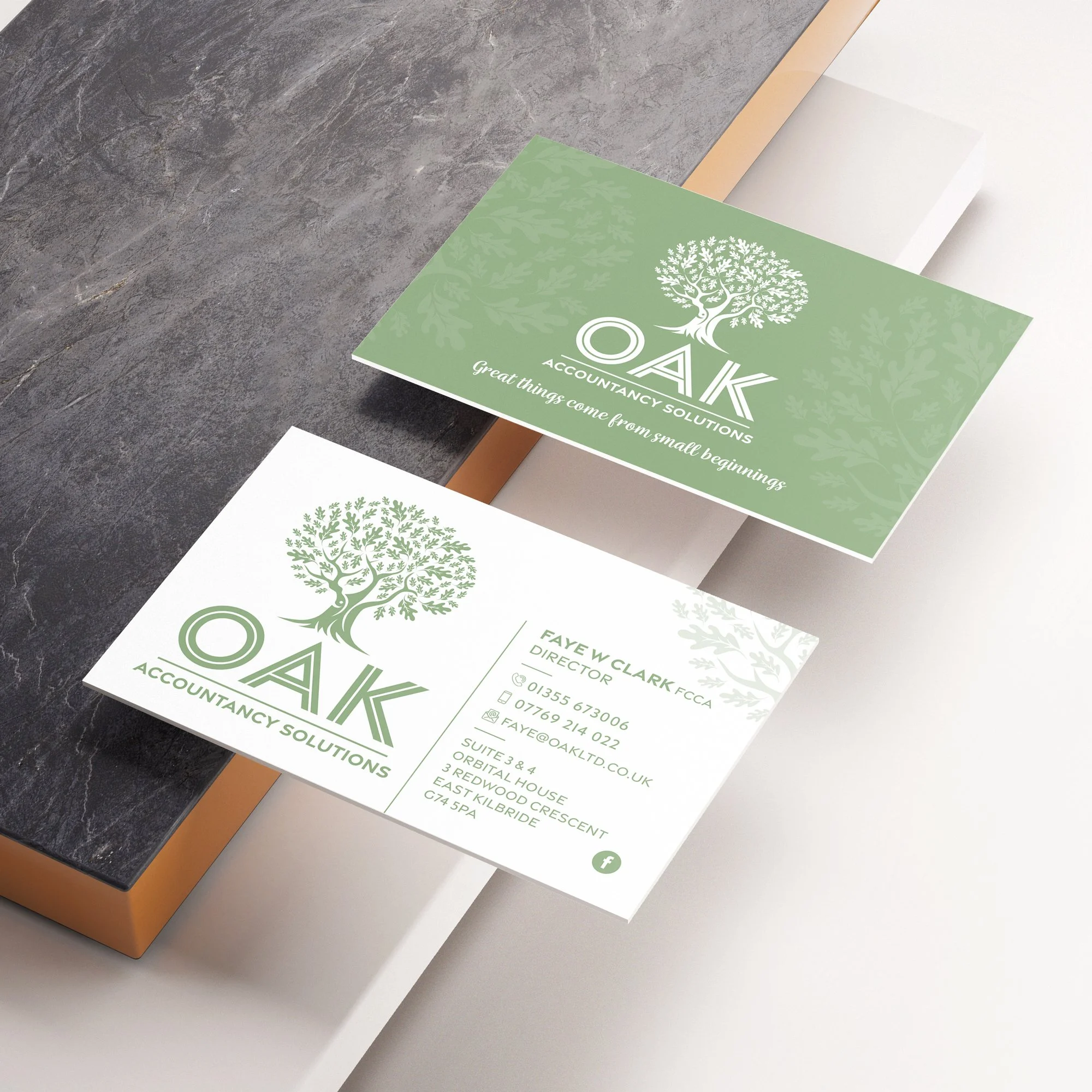 Business card for OAK Accountancy Solutions, green and white design, featuring a tree logo, name Faye W Clark, contact info, and tagline "Great things come from small beginnings."