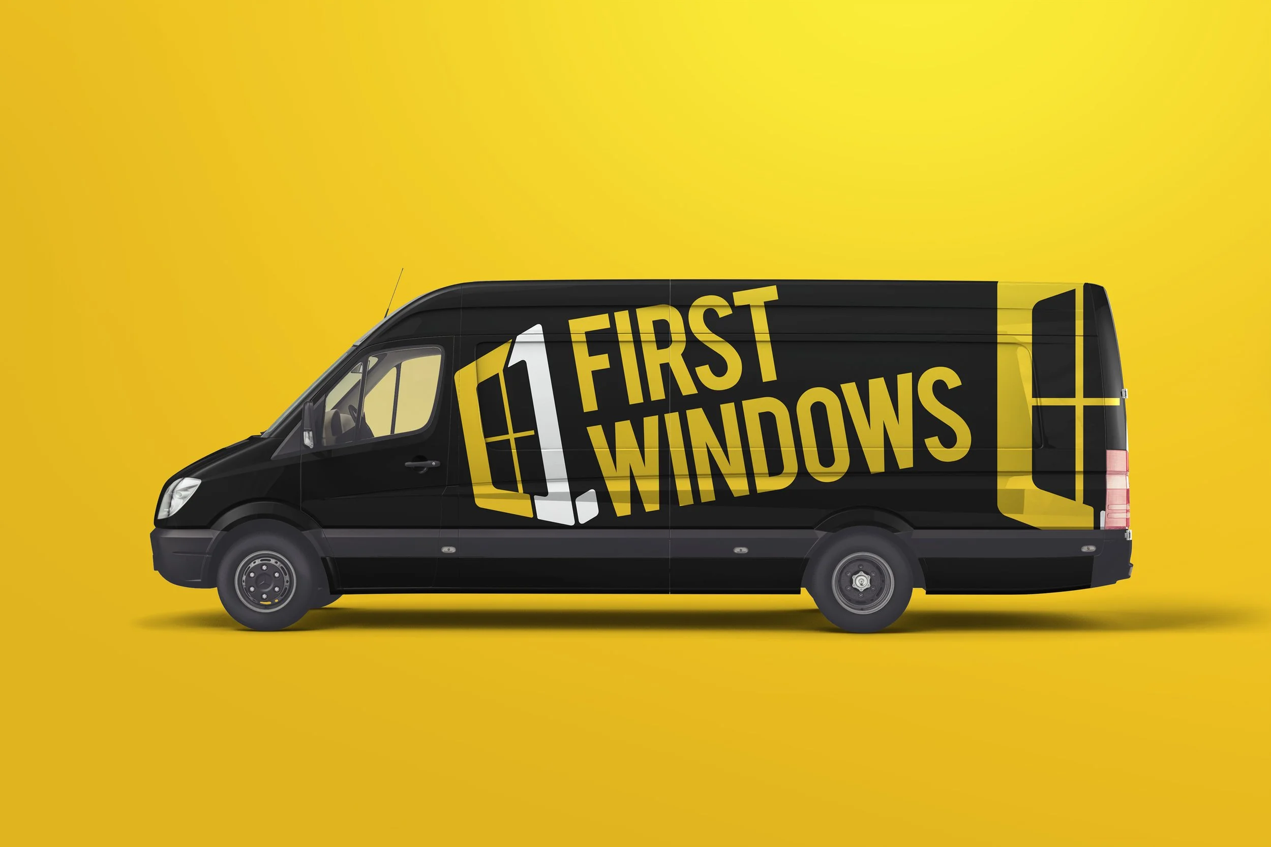 Black delivery van with yellow window graphic and text reading 'First Windows' on a yellow background.
