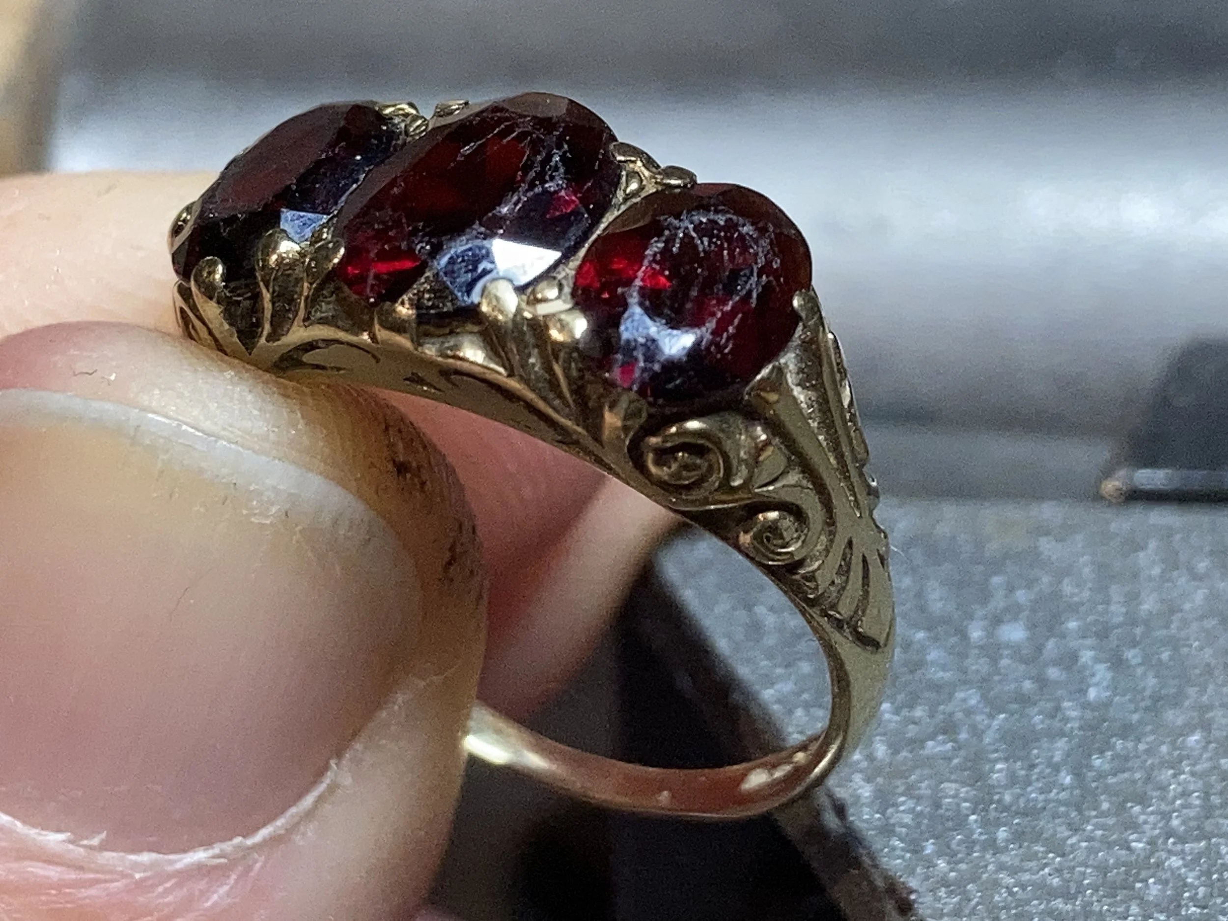 Inspecting a ring for damage.JPG