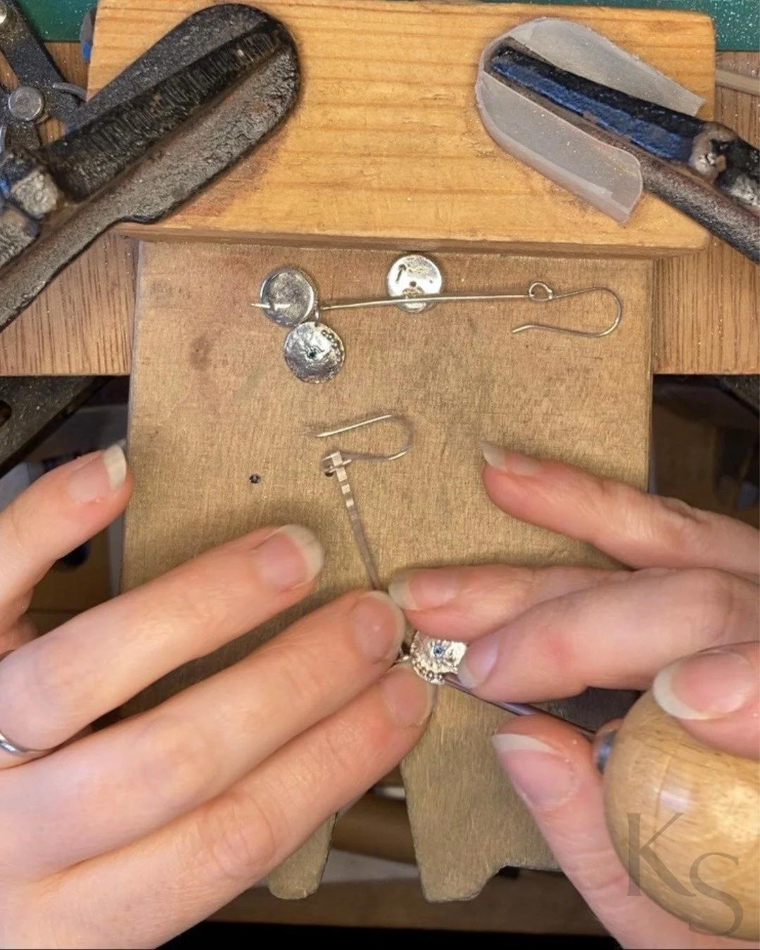 The discipline of the process is where the clarity is found.

Here, I'm flush-setting the sapphire into the centre of the Radiance drop earring. 

Stone-setting is one of the last processes involved in creating a piece of jewellery and can be one of 