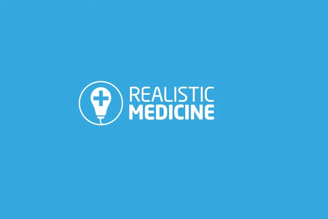 Realistic Medicine Logo: Blue background with a white medical icon and the text 'Realistic Medicine'.