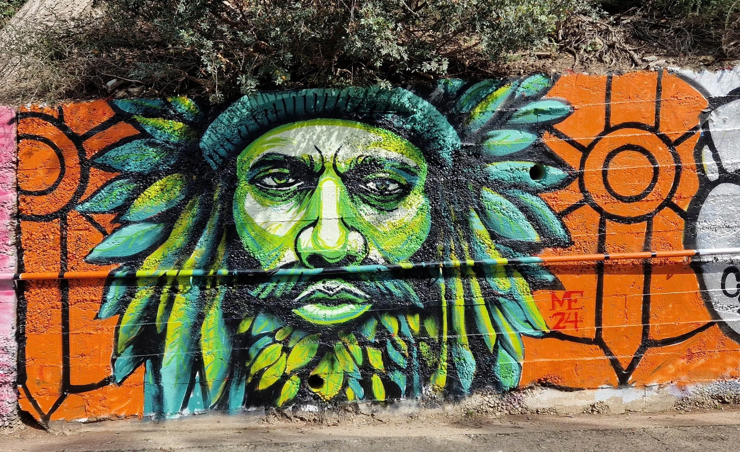 Green Man, exterior mural by Matthew Rush Elmore.