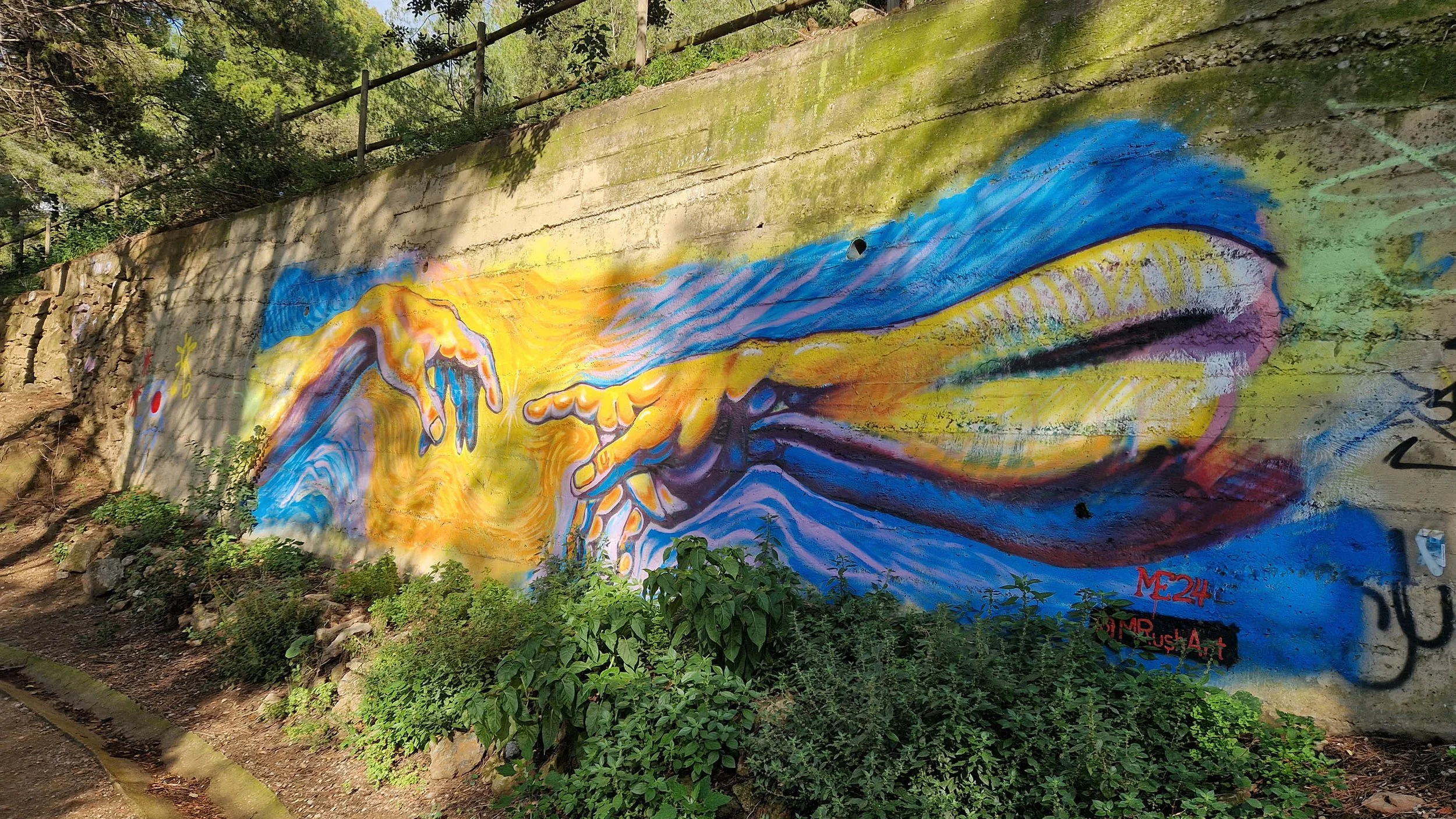 Adam and God, exterior mural by Matthew Rush Elmore.