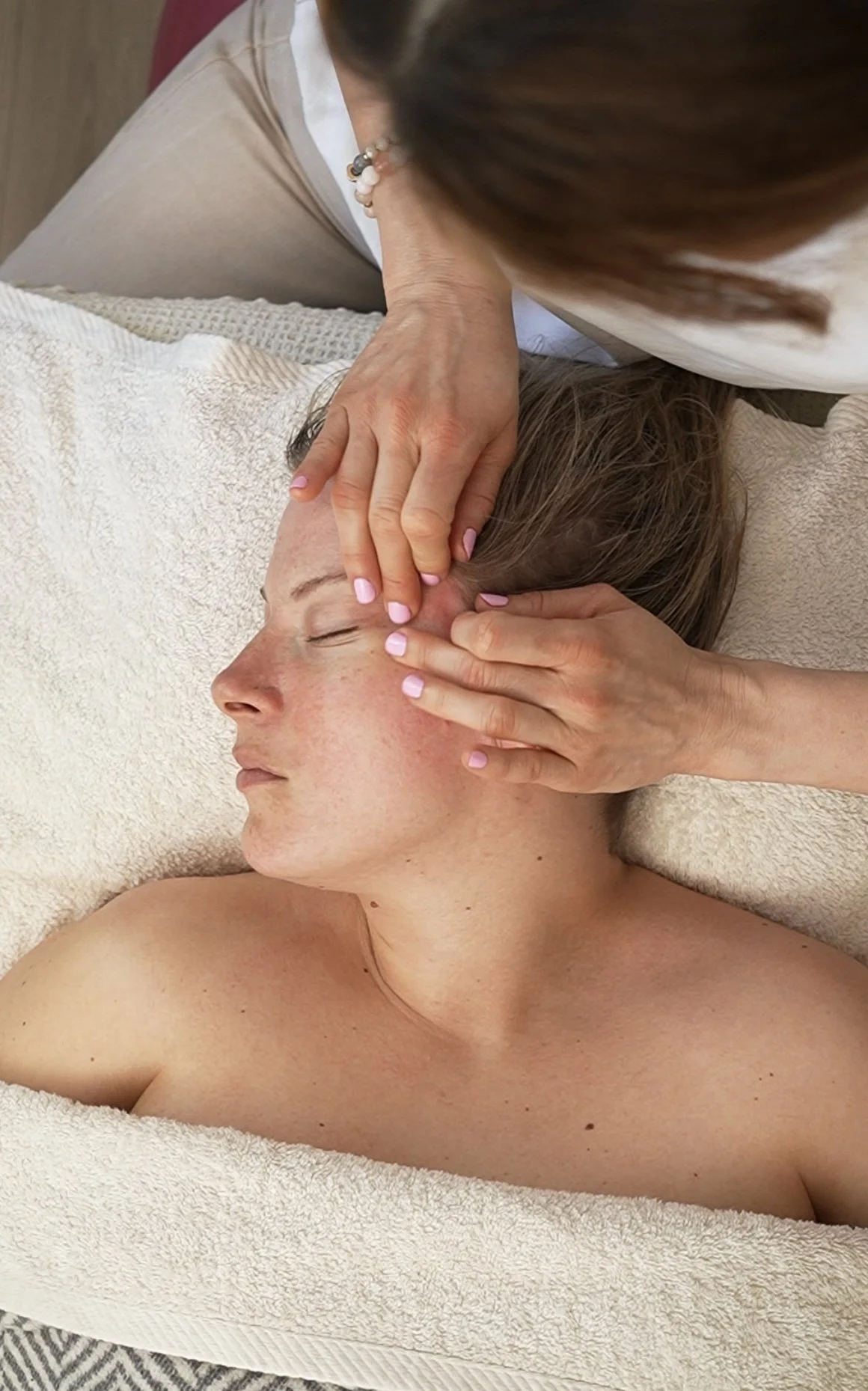 Professional facial massage treatment for relaxation and skin wellness in Queen's Park, London
