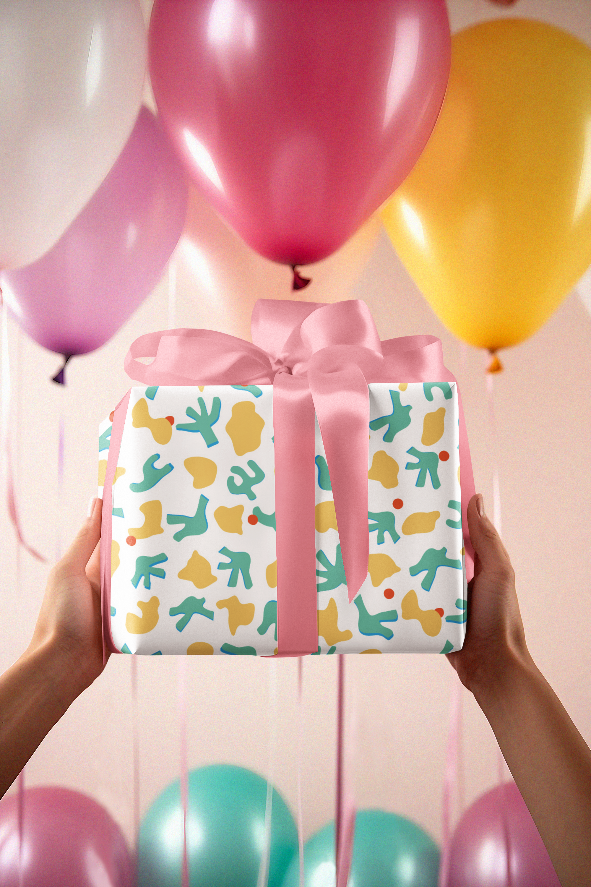 wrapping-paper-mockup-featuring-an-ai-generated-woman-holding-a-birthday-present-m35663.png
