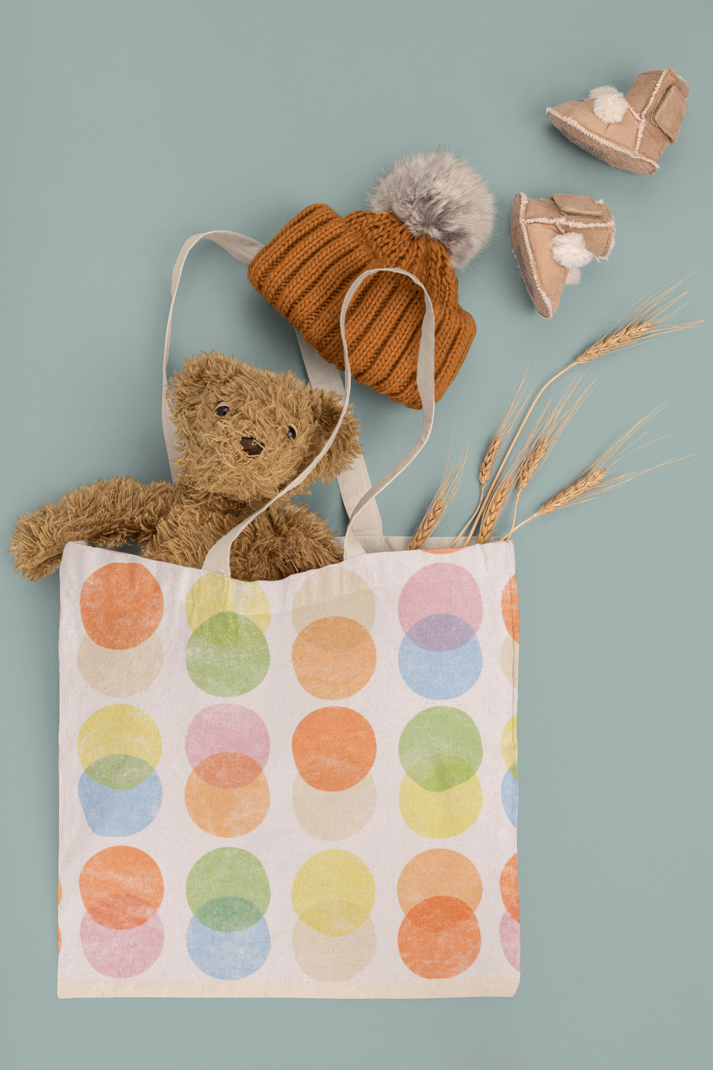 tote-bag-mockup-featuring-a-teddy-bear-and-baby-garments-m1137.png