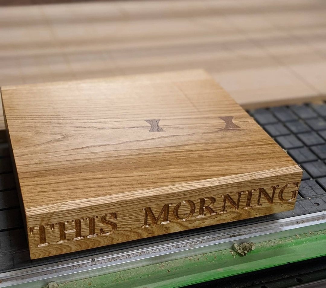 Custom engraving onto chopping board edge, on behalf of Cedar, Cutts & Moore Ltd for This Morning, ITV
