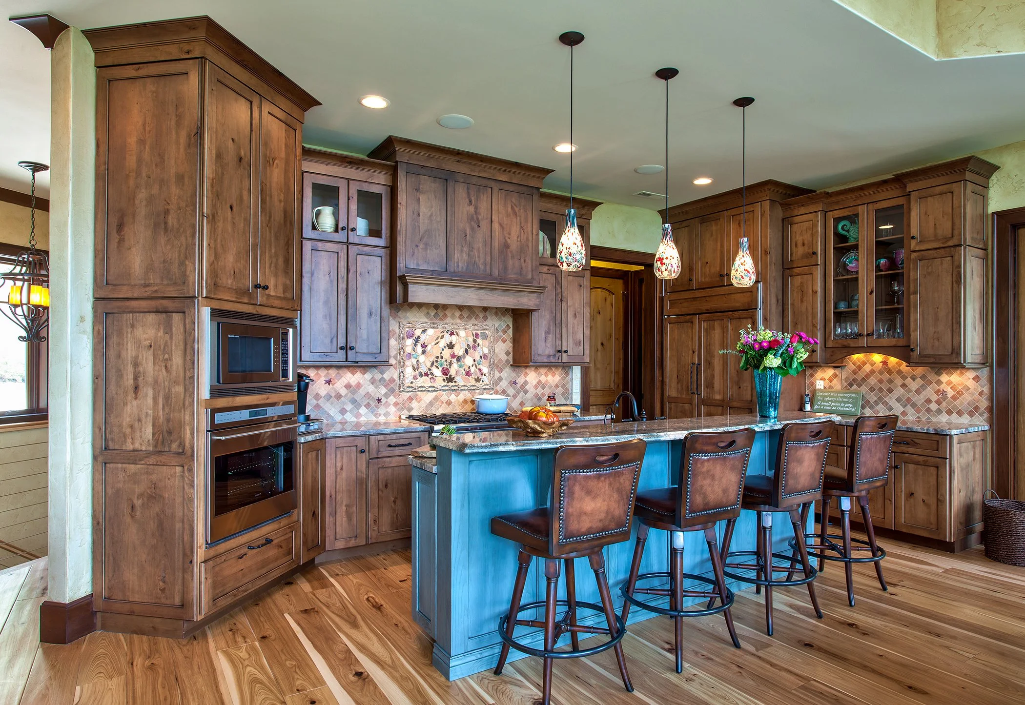 Stockton-door-style-in-Knotty-Alder-wood-with-Custom-Stain-by-Advance-Cabinetry.jpg
