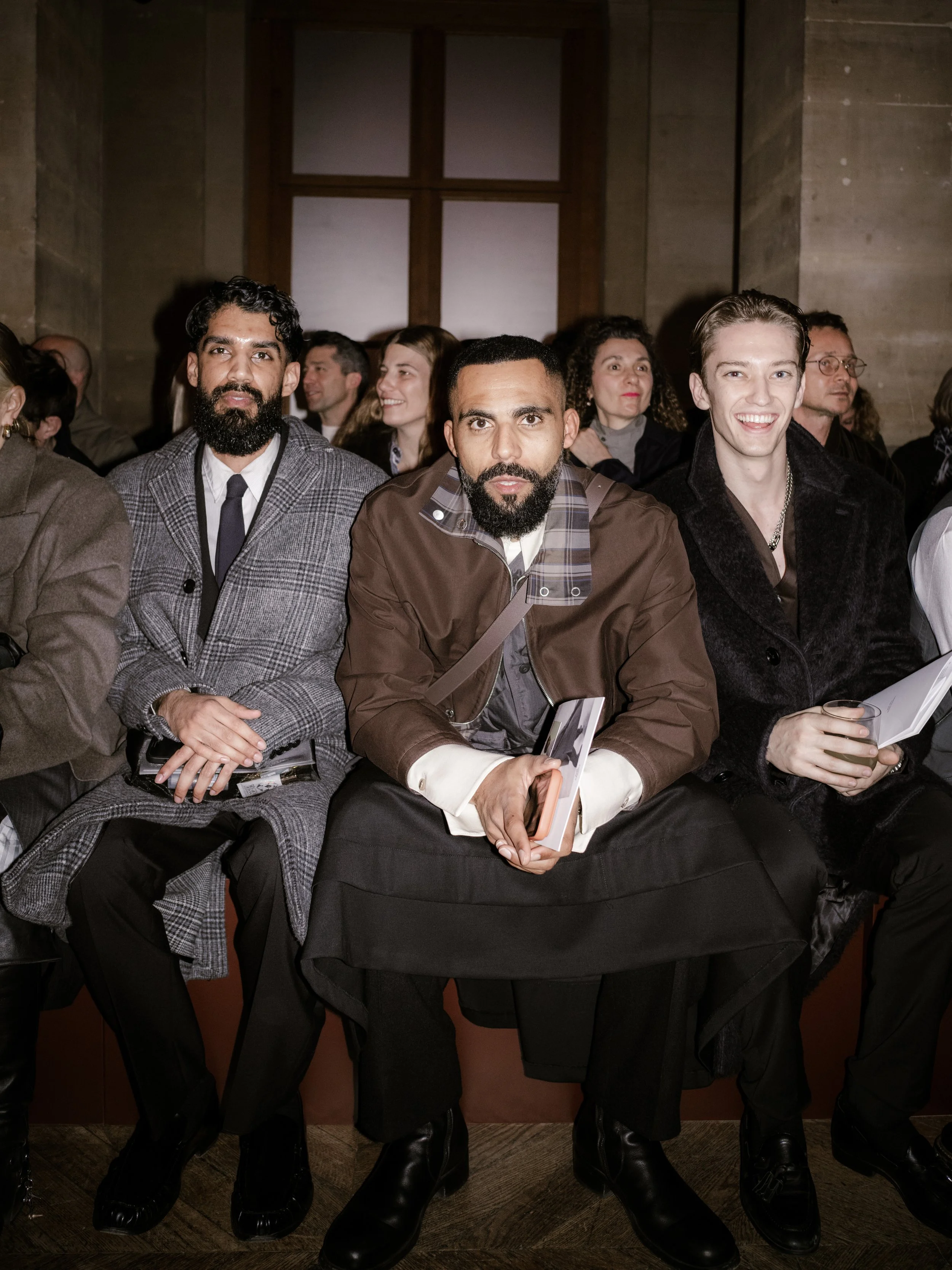 Jean-Claude Mpassy sitting Front Row at the Hermès show during Paris Fashion Week.