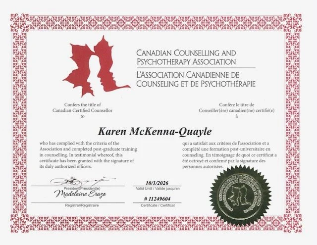 Canadian Counselling and Psychotherapy Association certificate awarded to Karen McKenna-Quayle. Features red maple leaf design, black and white text, and a gold seal.