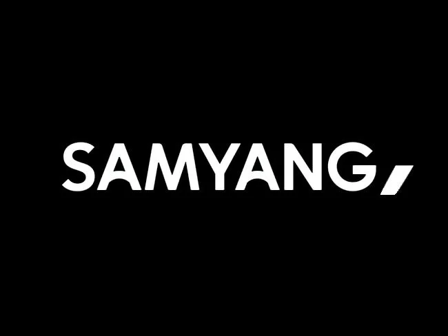 Black background with white text reading 'SAMYANG,' stylized with a slight slash could be a logo or brand name