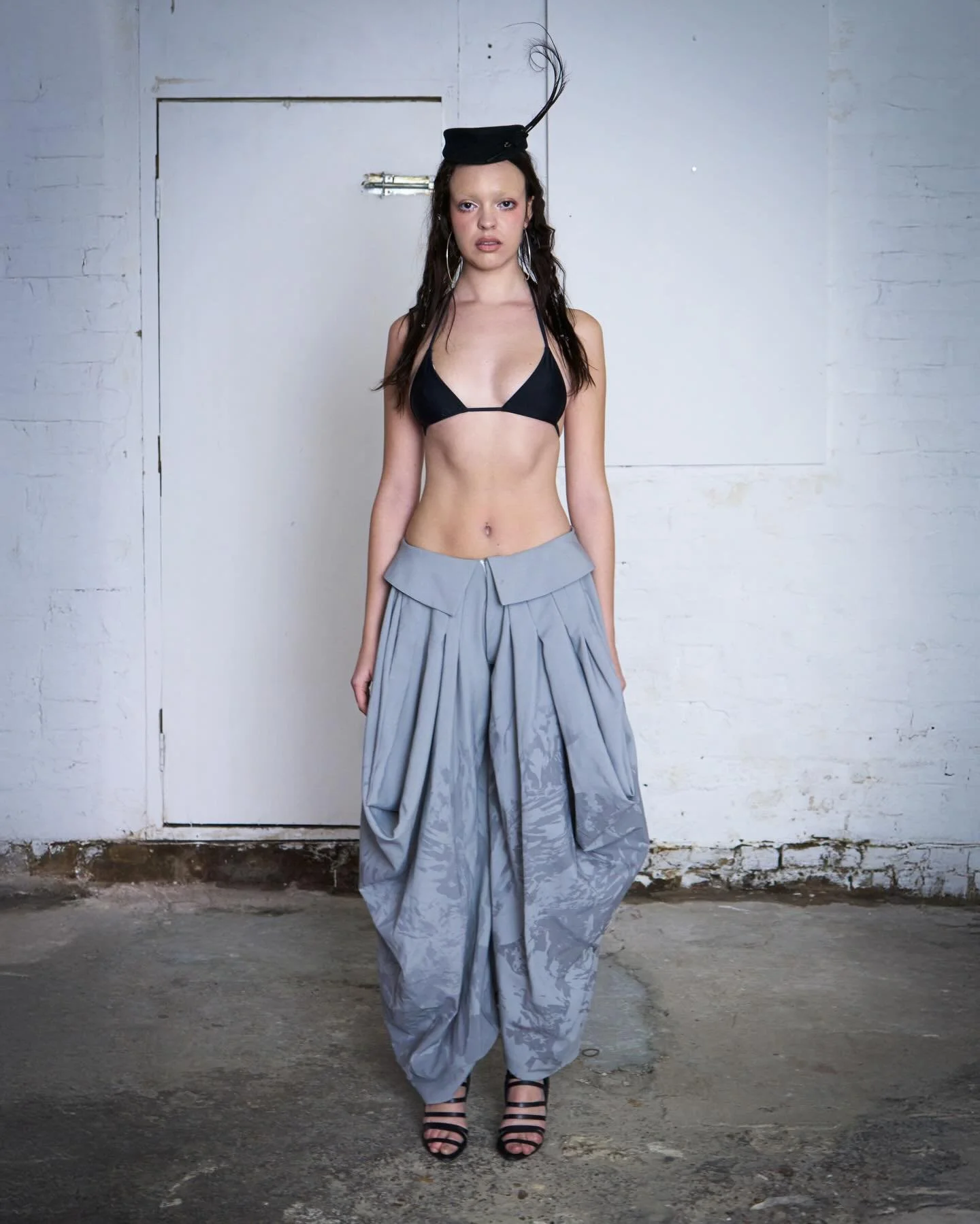 &lsquo;NESTED&rsquo; READY-TO-WEAR CAPSULE 🪺
A journey of belonging and becoming a new version of yourself whilst embracing heritage and tradition through thai folklore and costume, reimagining a part of home in every creation. 

Look 3 ๓:
Plume cap