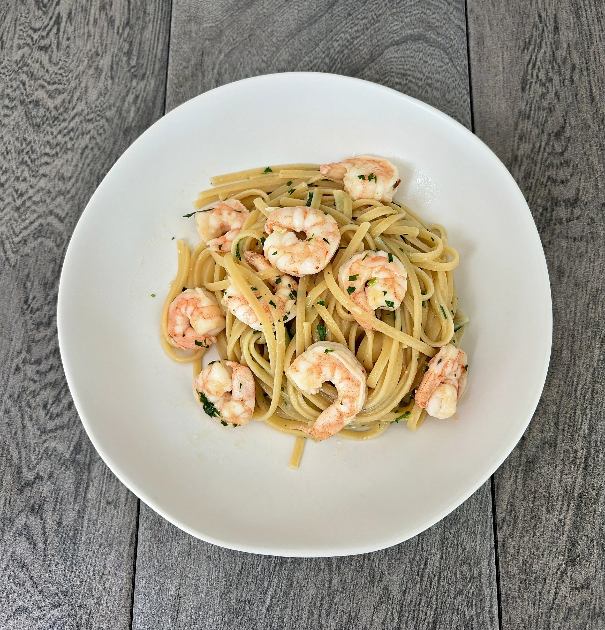 Italian-American shrimp scampi with pasta prepared and photographed by Jack Valerio for The Guaranteed Gourmet.