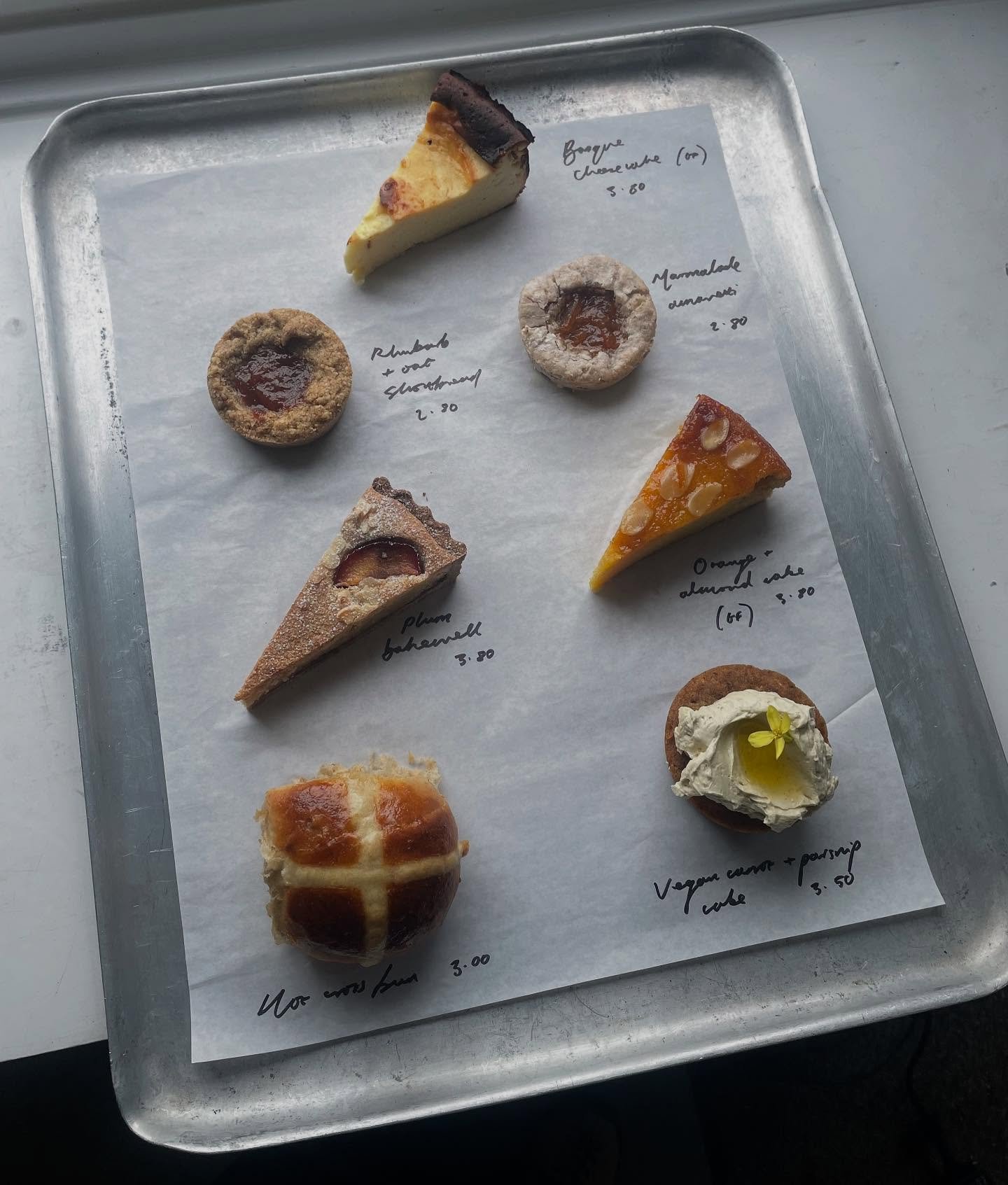 This weekend&rsquo;s bakes @plattfields_marketgarden 🐣 

Hot cross bun
Vegan carrot, parsnip, and olive oil cake
Plum bakewell
Orange and almond cake
Rhubarb and oat shortbread 
Marmalade amaretti
Basque cheesecake