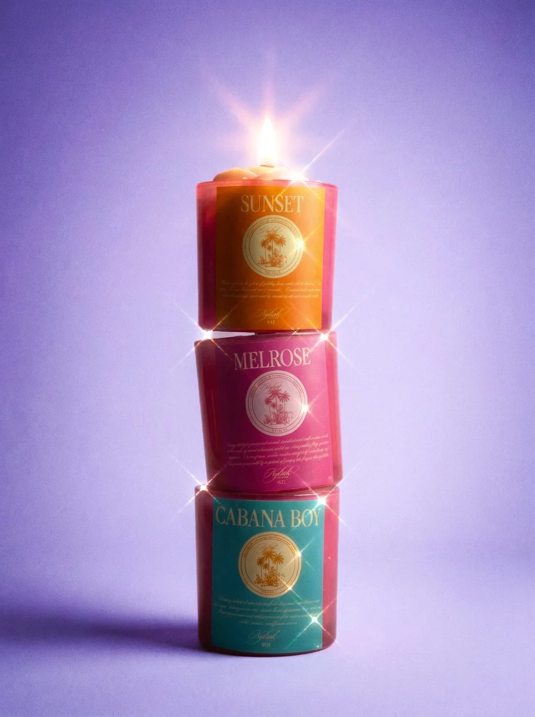 Stacked colorful candles labeled "Sunset," "Melrose," and "Cabana Boy" against a purple background with glowing light effects.