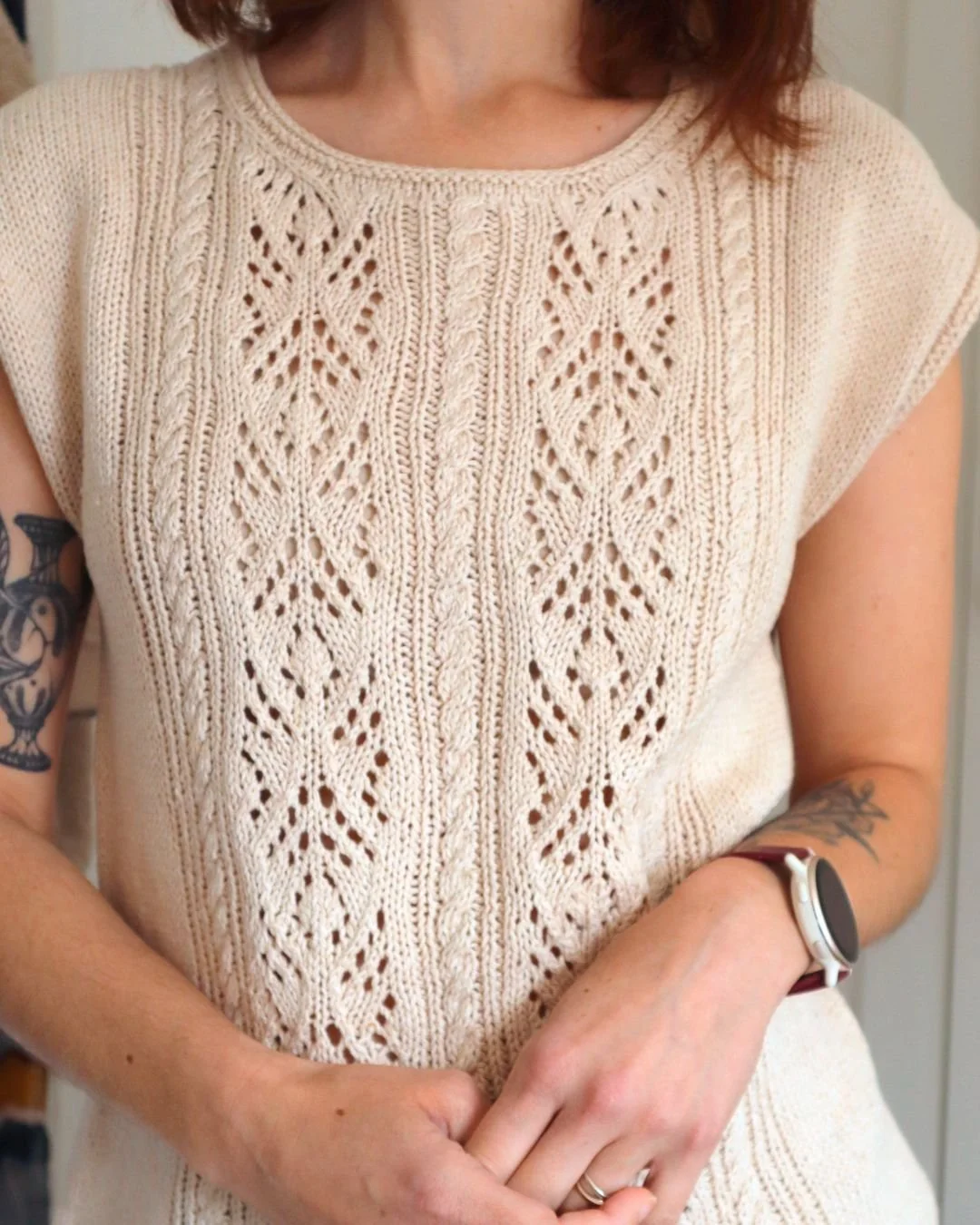 ✏️ Working on the grading of this summer knit is challenging because of the lace and cable pattern on the front panel.

Each size will have their own neckline shaping and therefore will need their own charts and instructions. It's a lot of work, but 