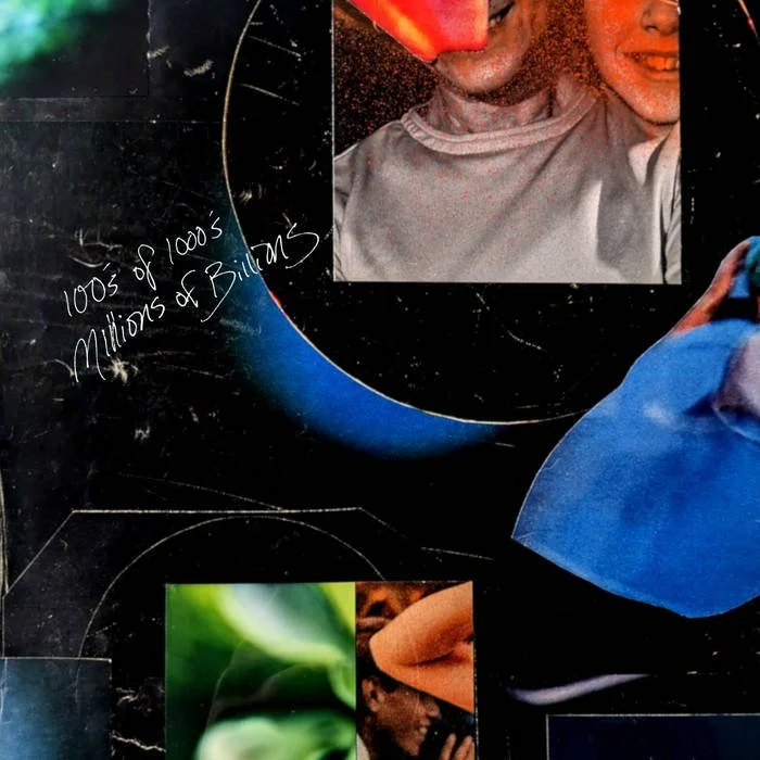 Close-up of a section of a black background with handwritten text that reads '100% of 100's Millions of Building', and partial images of a man and a woman hugging, along with a green and brown plant photo.
