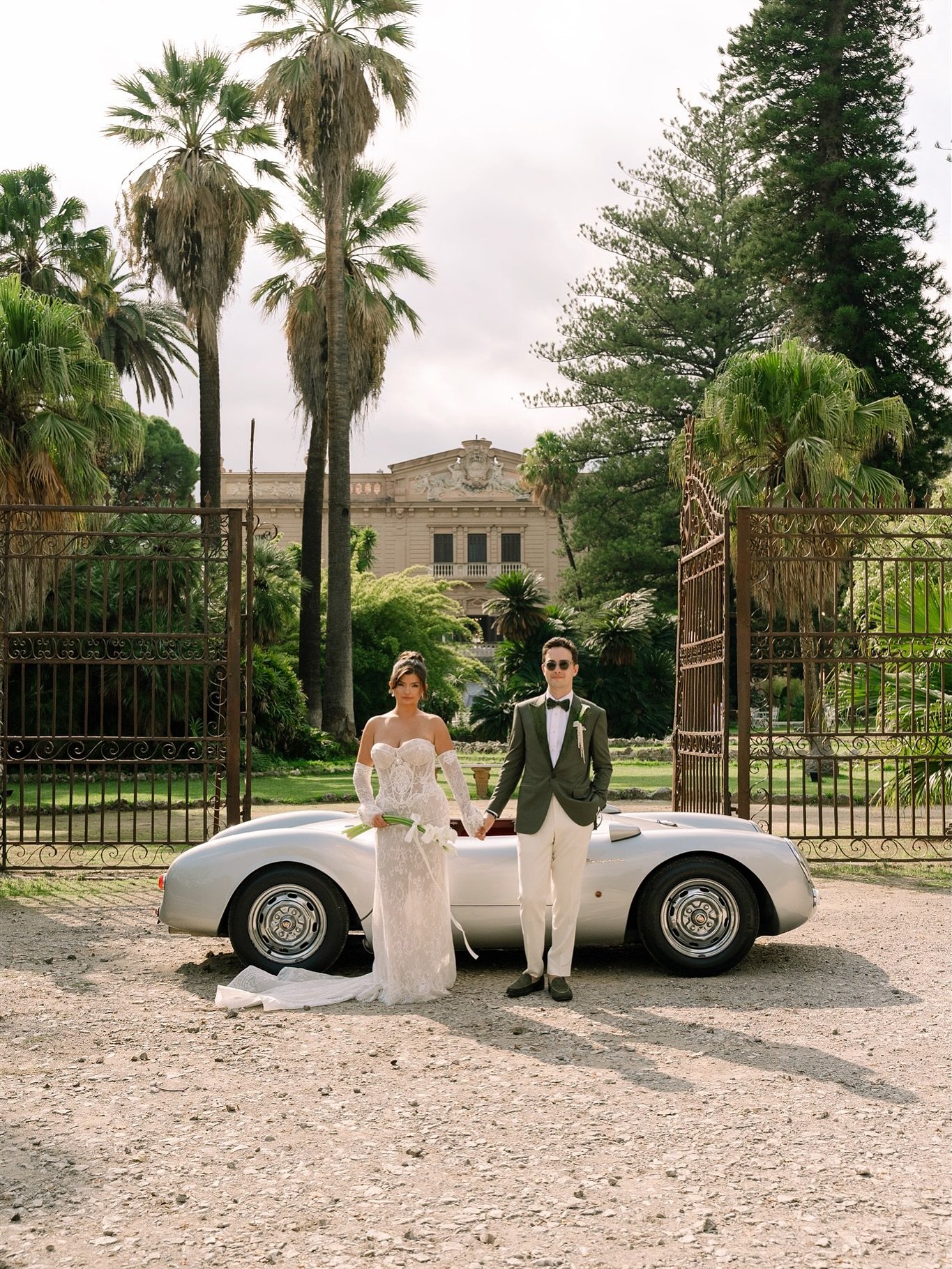 Finally sharing more from Klea &amp; Drew&rsquo;s wedding at Villa Tasca in Sicily.
Sun, palms, an old Porsche, cake + sparks, and a dance floor which was pure chaos in the best way. Albanian traditions brought unreal energy. And the colors.. still n