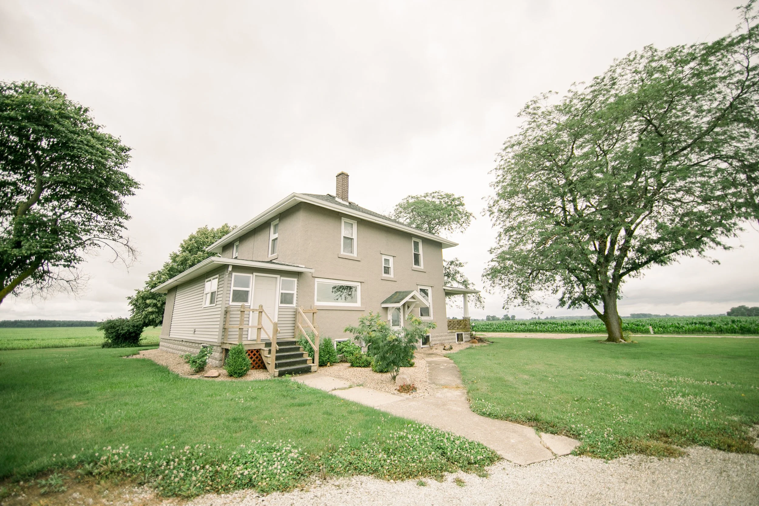 Side-view of the two-story house. 