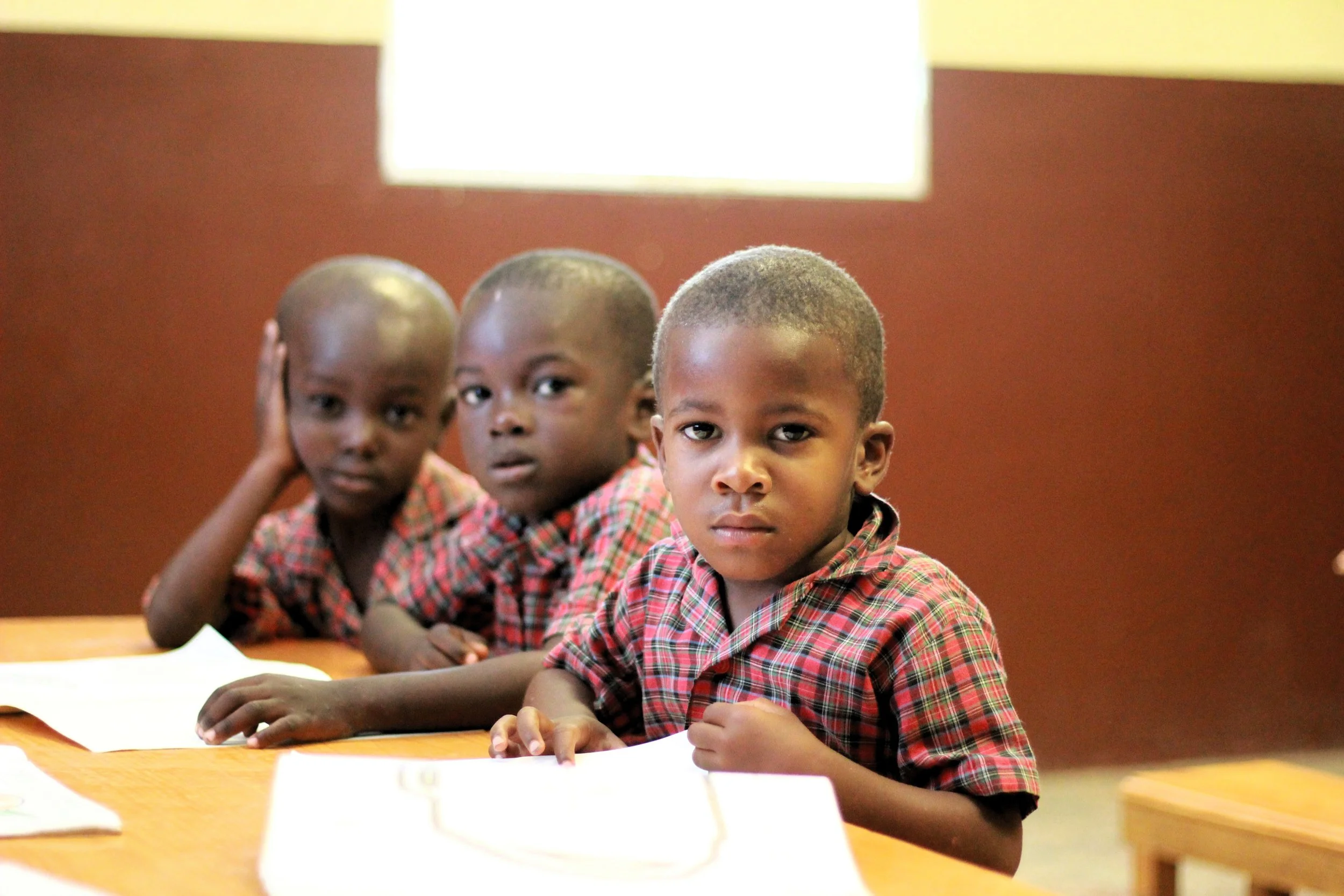 Three little boys in school