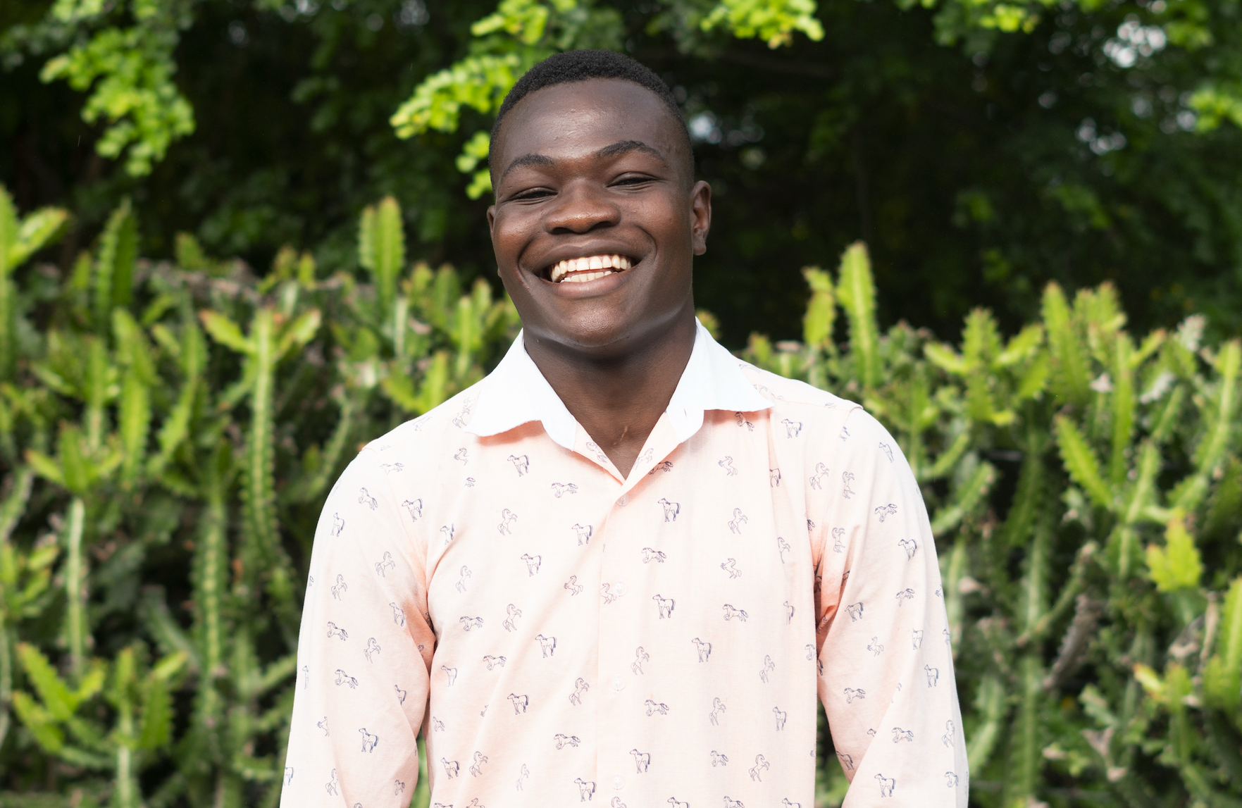 Young Haitian man smiling