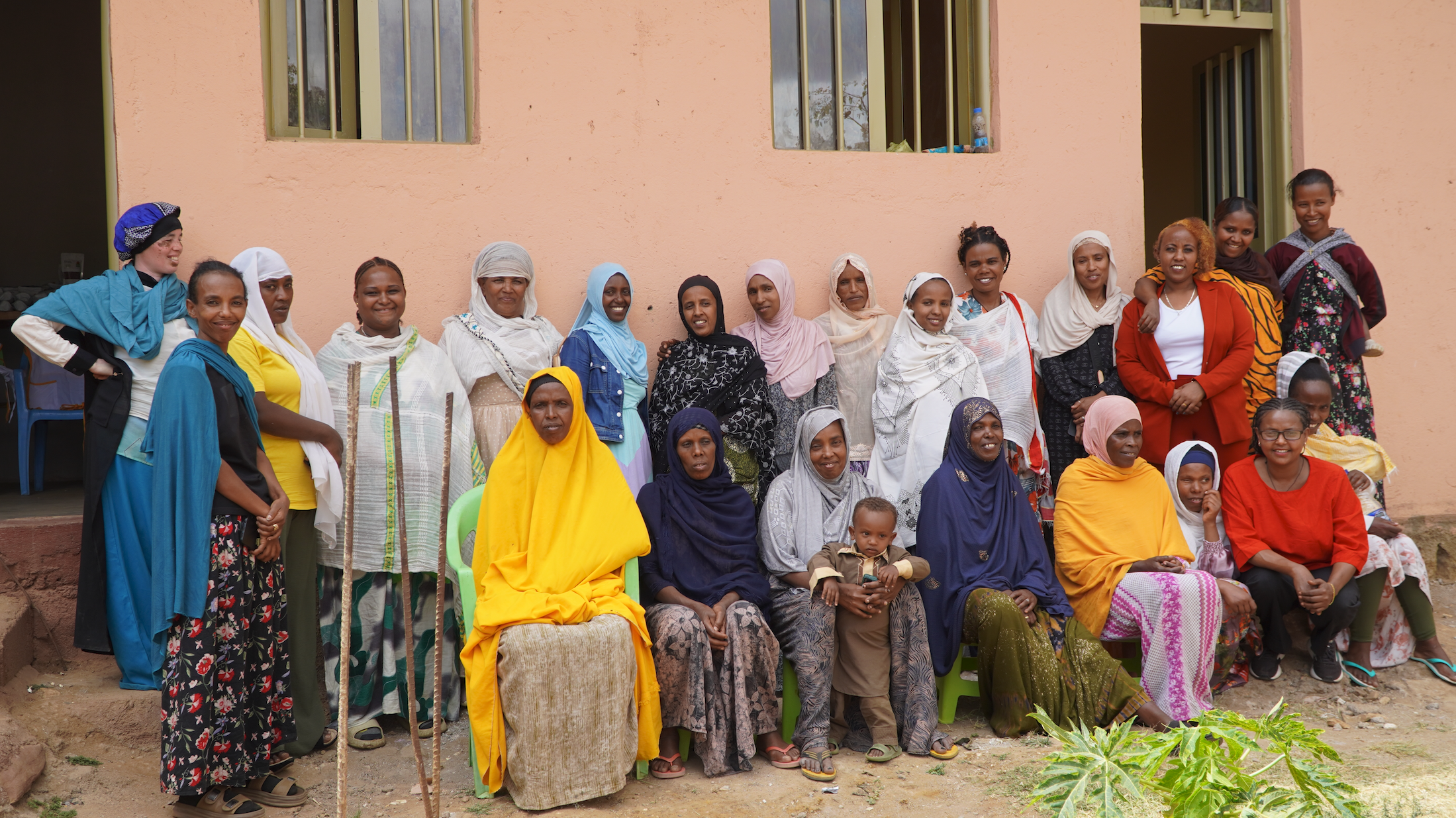 Large group of mothers smile together