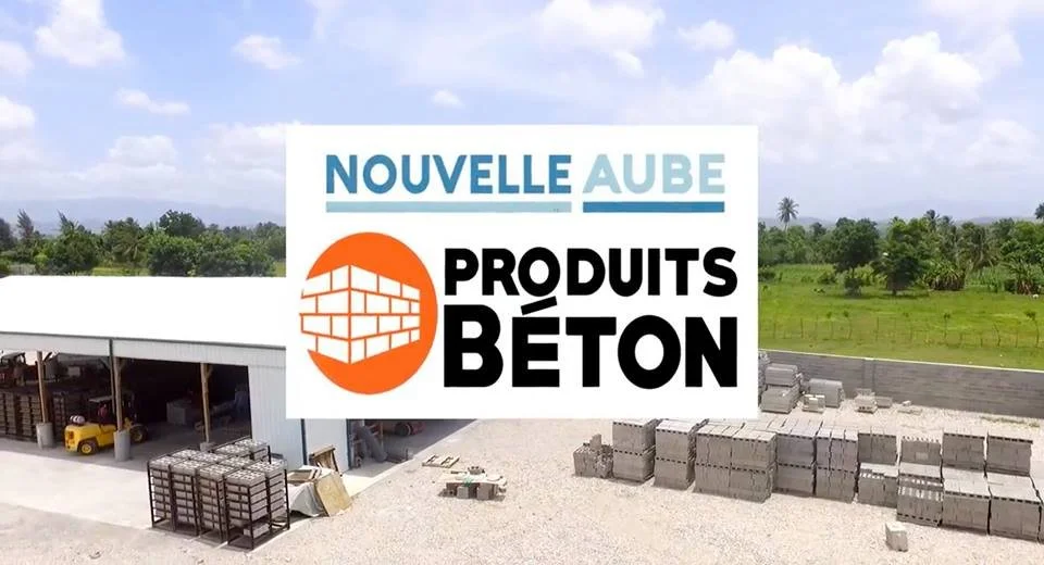 Haiti business: Nouvelle Aube Produits Beton logo with the cement block plant in the background