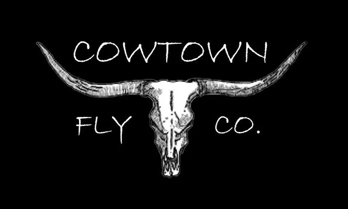 Logo for Cowtown Fly Co. with a cow skull and horns on a black background.