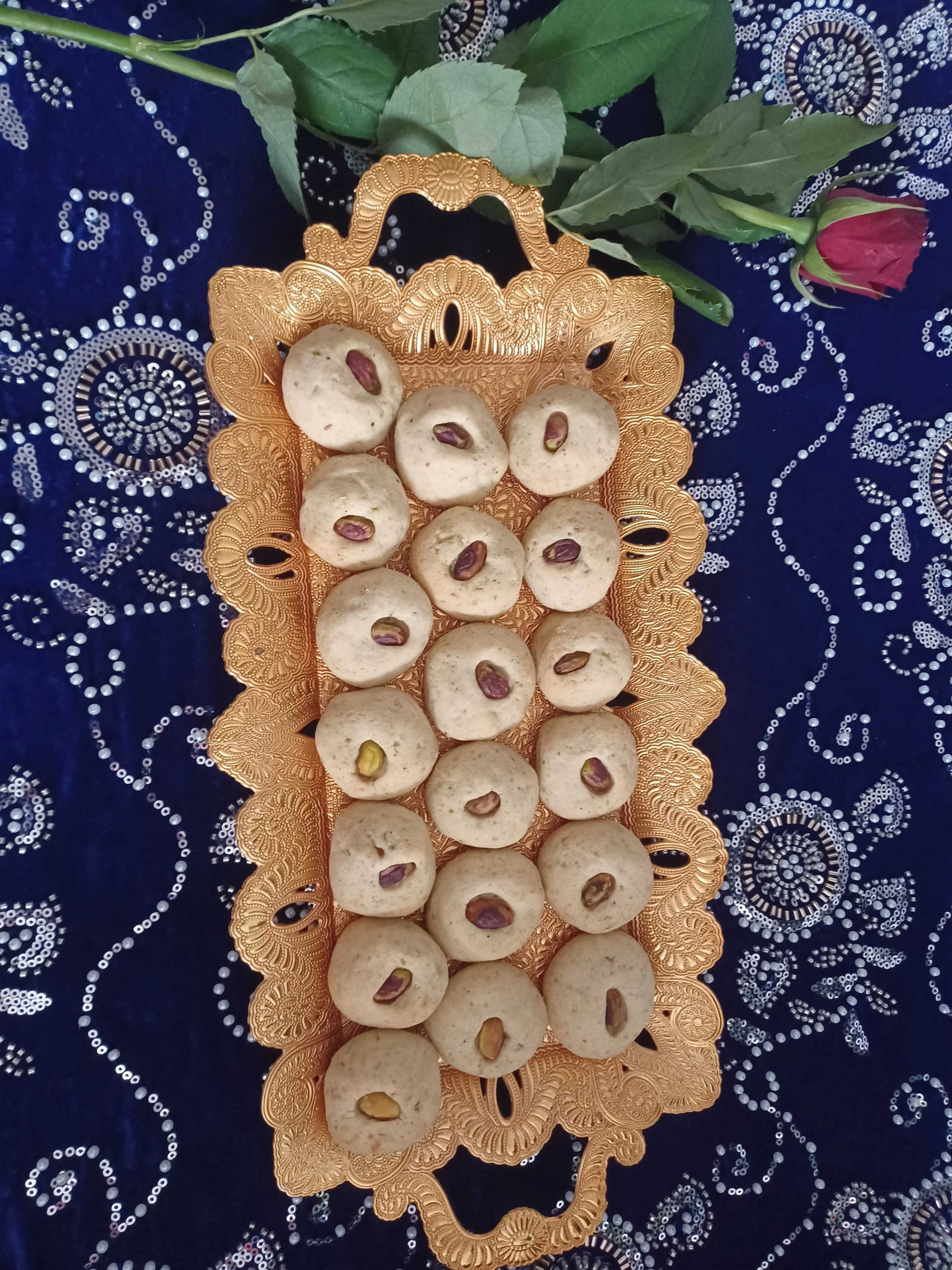 Pistachio Biscuits on a golden tray.jpg