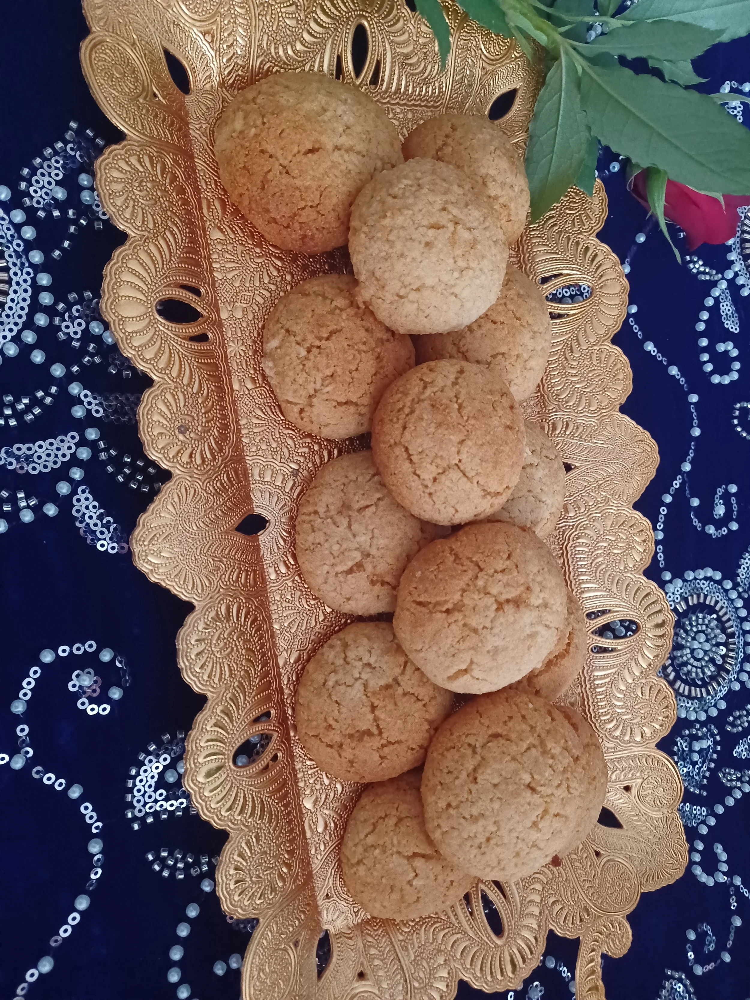 Coconut Biscuits on a golden tray.jpg