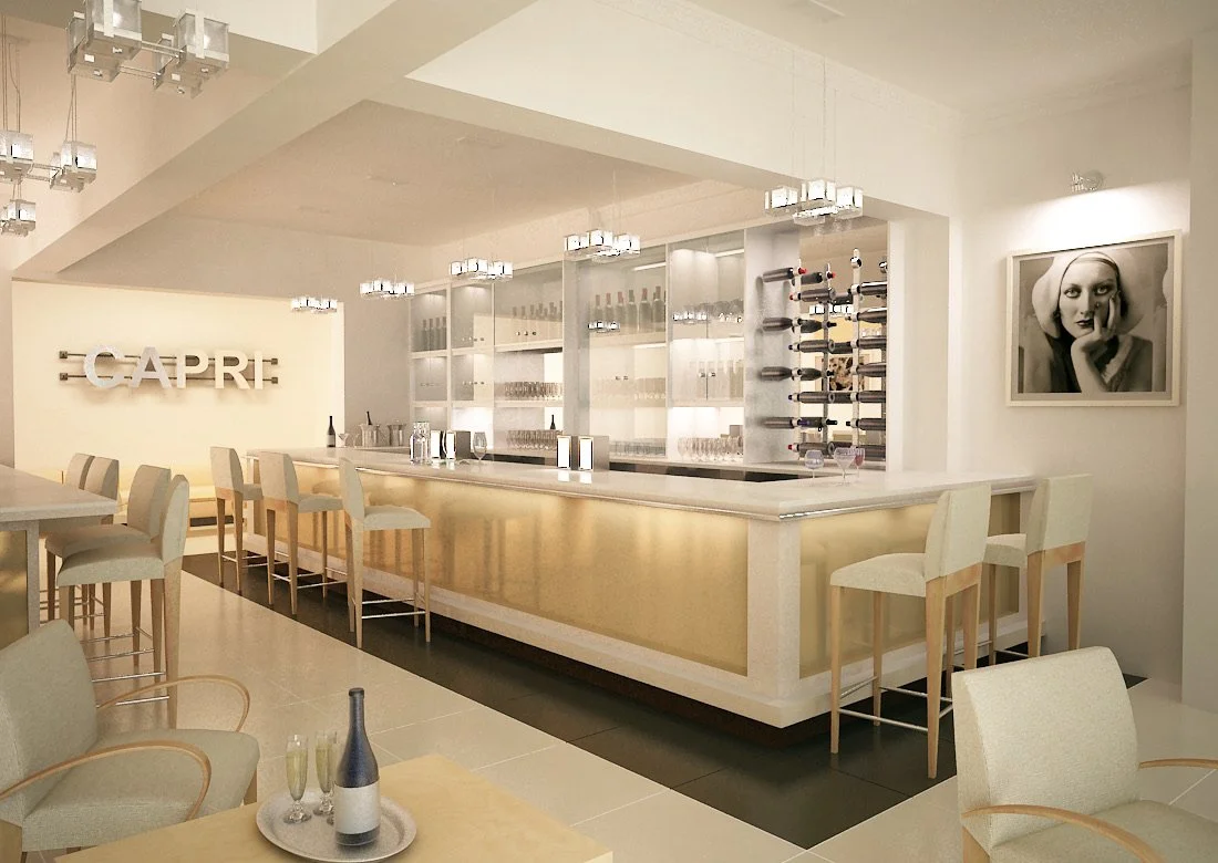 Modern, minimalistic bar with white and beige decor, wine bottles on shelves, a countertop with drinks, and stylish chairs, with artwork on the wall and the name 'CAPRI' illuminated in the background.