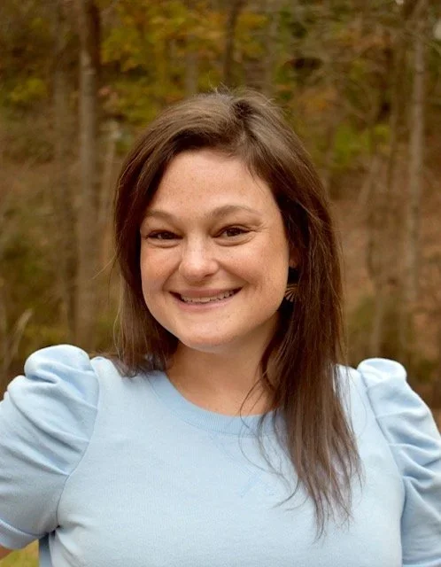 annie goldsmith rd, owner of second breakfast nutrition, smiling wearing a blue shirt