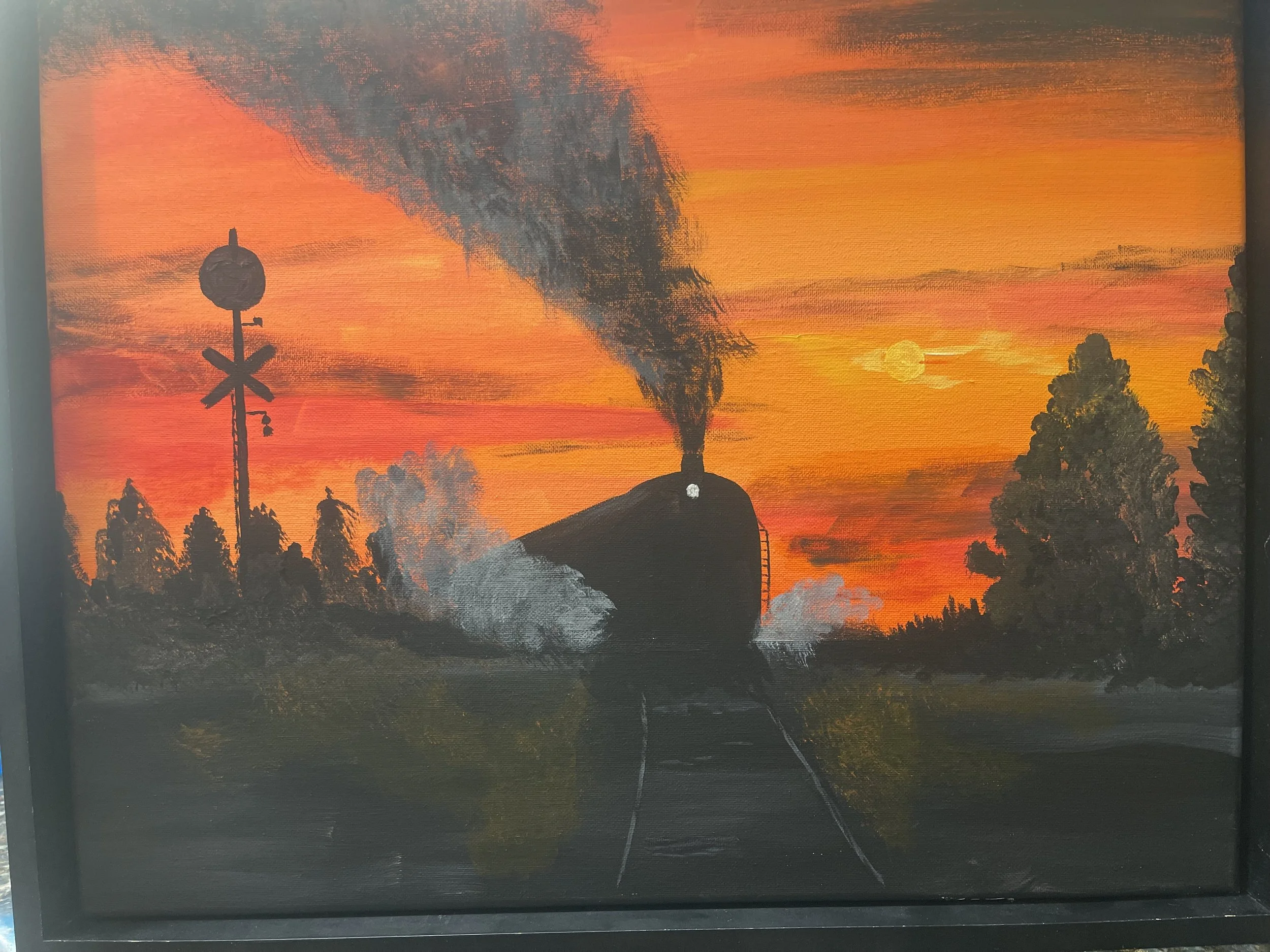 A painting depicting a sunset with an orange sky, a silhouette of an industrial building emitting black smoke, a coal hopper train on railroad tracks, and trees on either side of the tracks.
