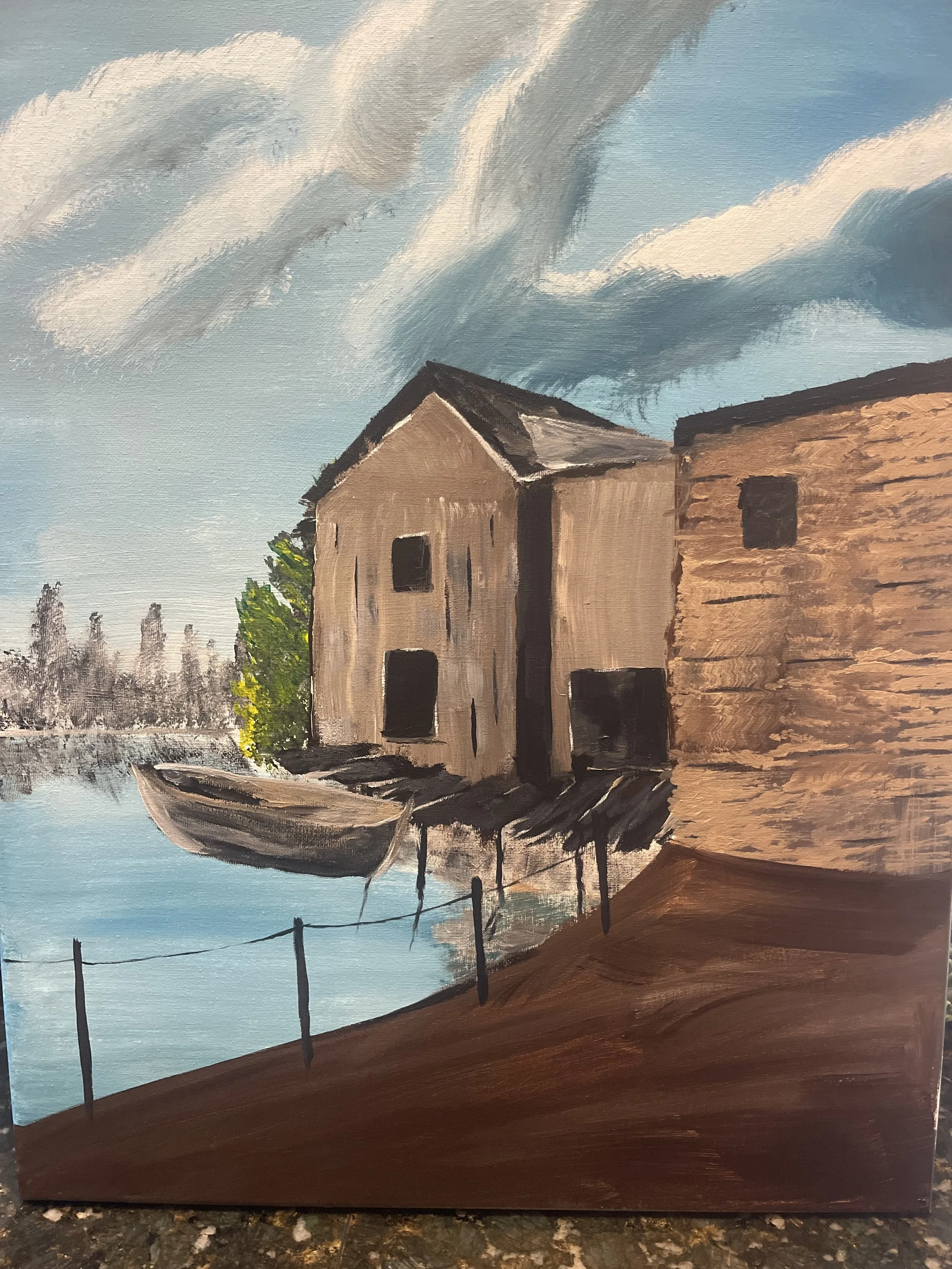 An oil painting of a lakeside scene featuring two old buildings, one in beige and one in brown, with a small boat docked near the shore. There are fences along the water's edge, and trees in the background under a partly cloudy sky.