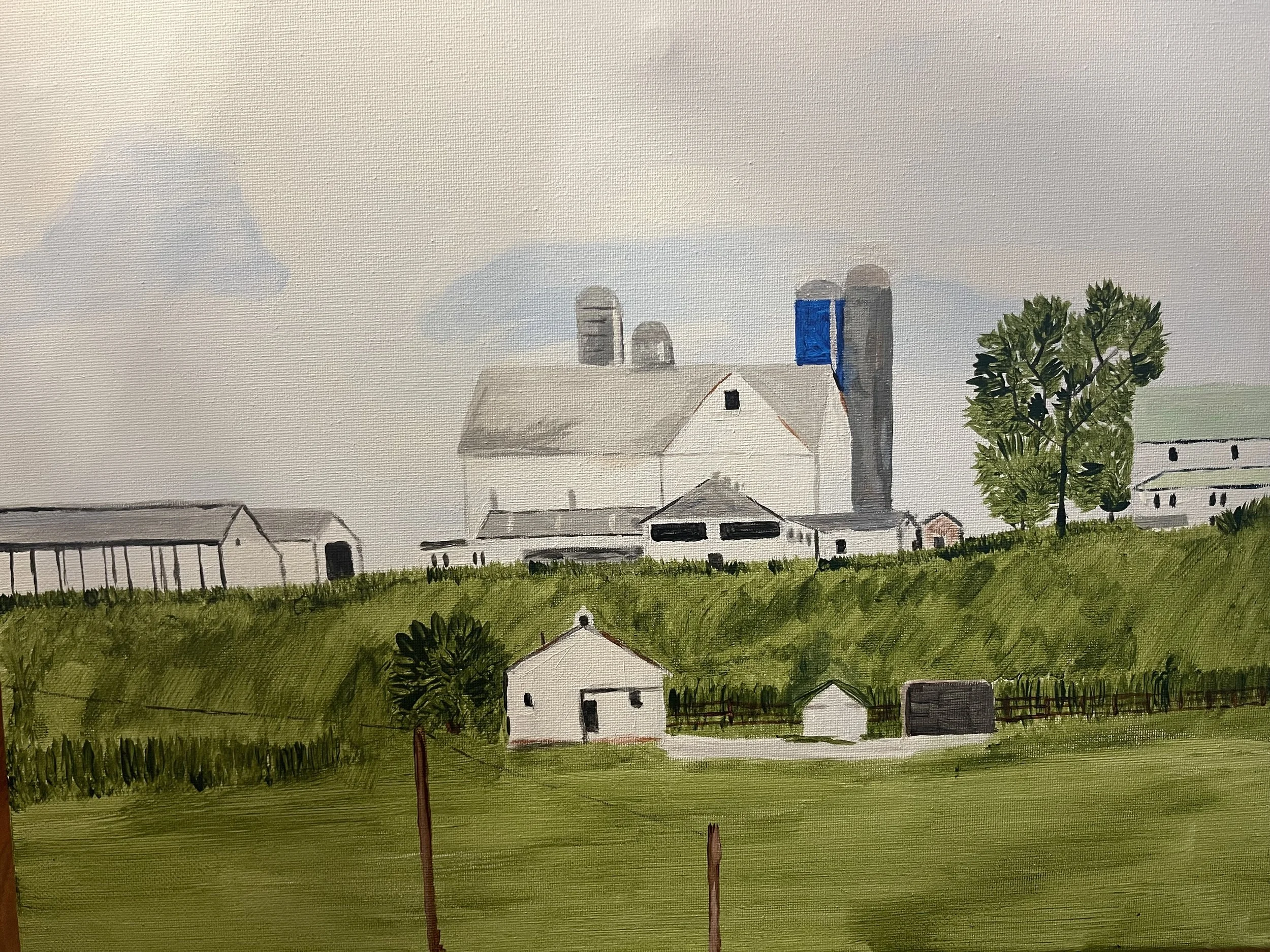 A watercolor painting of a rural farm scene with small white houses, green fields, a large barn or farmhouse, and silos in the background under a cloudy sky.