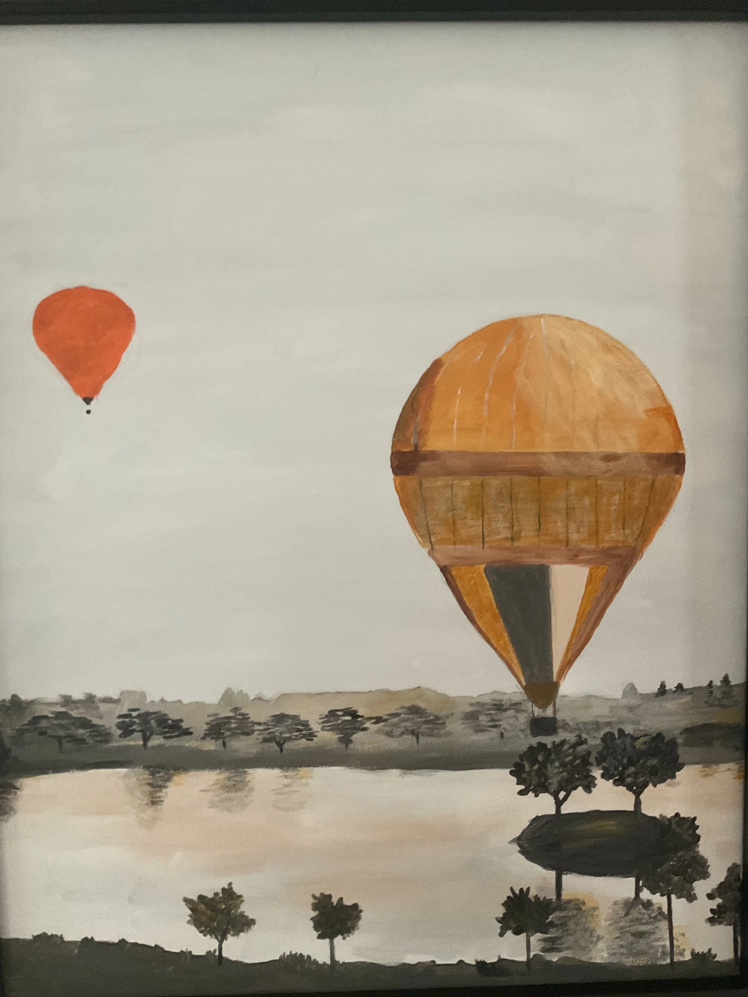 Painting of two hot air balloons floating over a landscape with a body of water and trees, in muted tones.