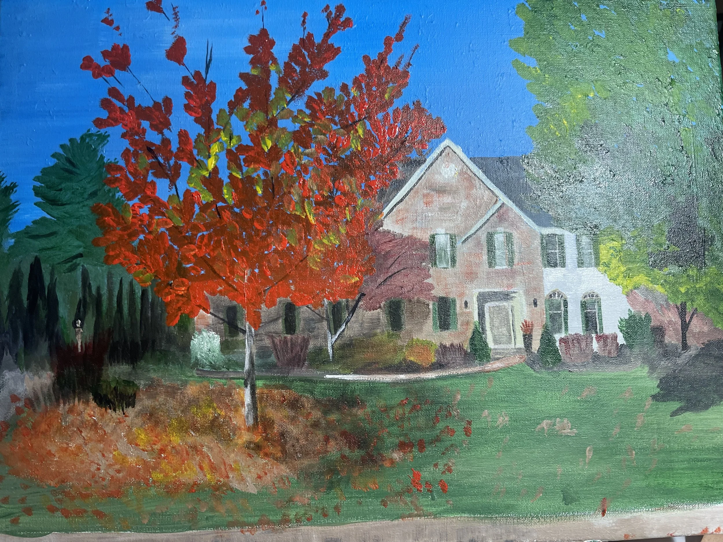 A painting of a house with a lush garden featuring a vibrant red tree in the foreground, green shrubs, and colorful foliage in a serene outdoor setting under a blue sky.