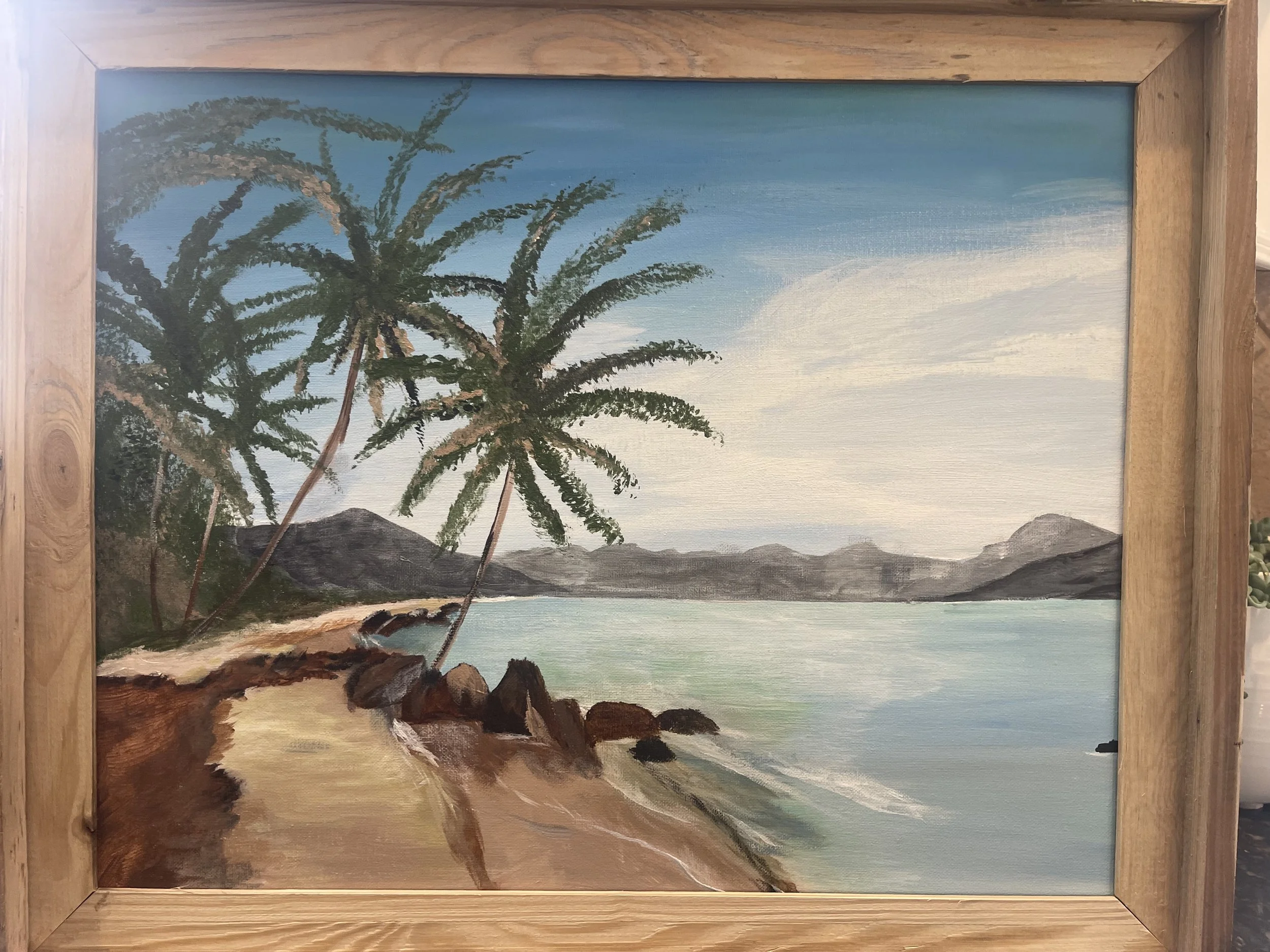 Painting of a tropical beach scene with palm trees, rocky shoreline, mountains in the background, and a partly cloudy sky.