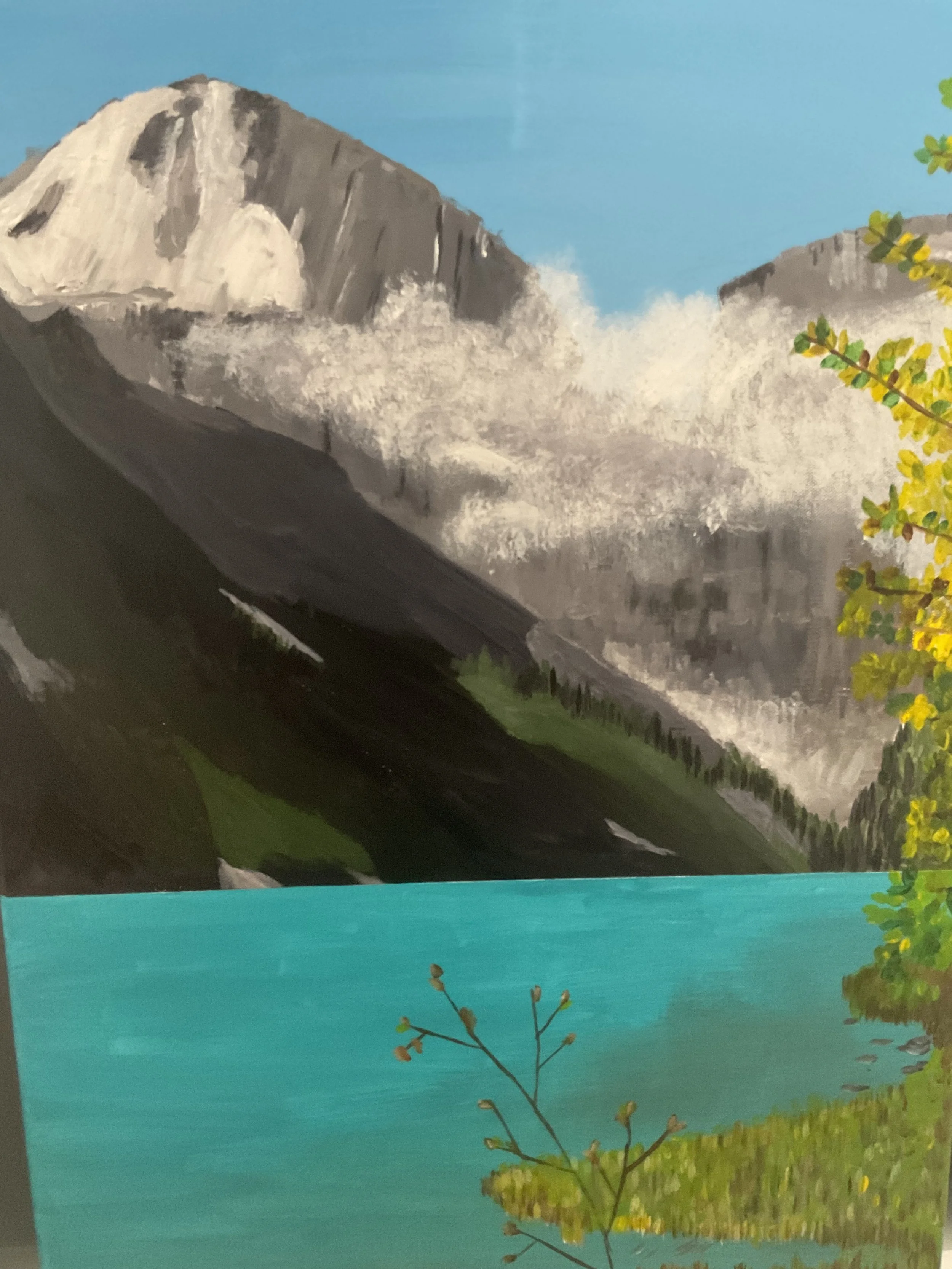 Painting of a mountain landscape with snow-capped peaks, green hills, a body of water in the foreground, and a tree with yellow and green leaves.