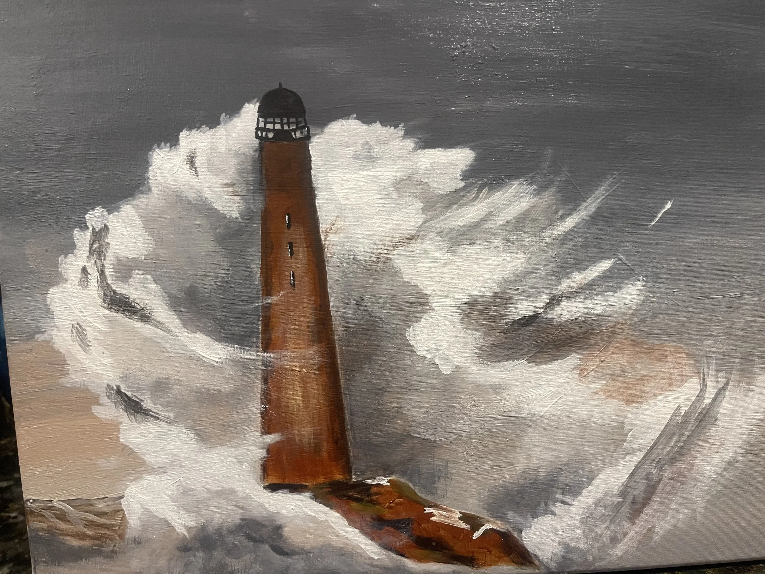 Painting of a lighthouse on a rocky coast with large crashing waves and a cloudy, stormy sky.