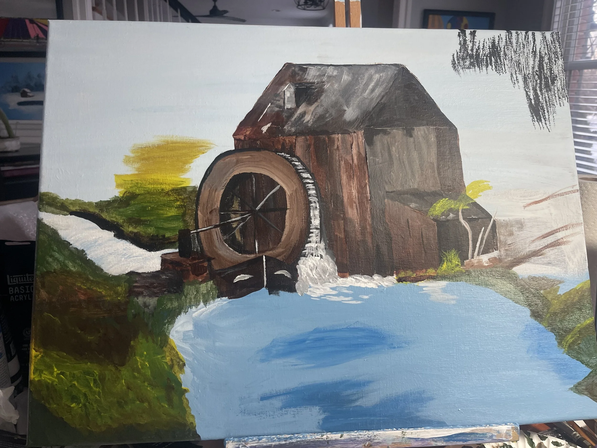 Painting of a rustic watermill with a large wooden wheel, water flowing around it, and a creek or river in the foreground with green vegetation and trees around.