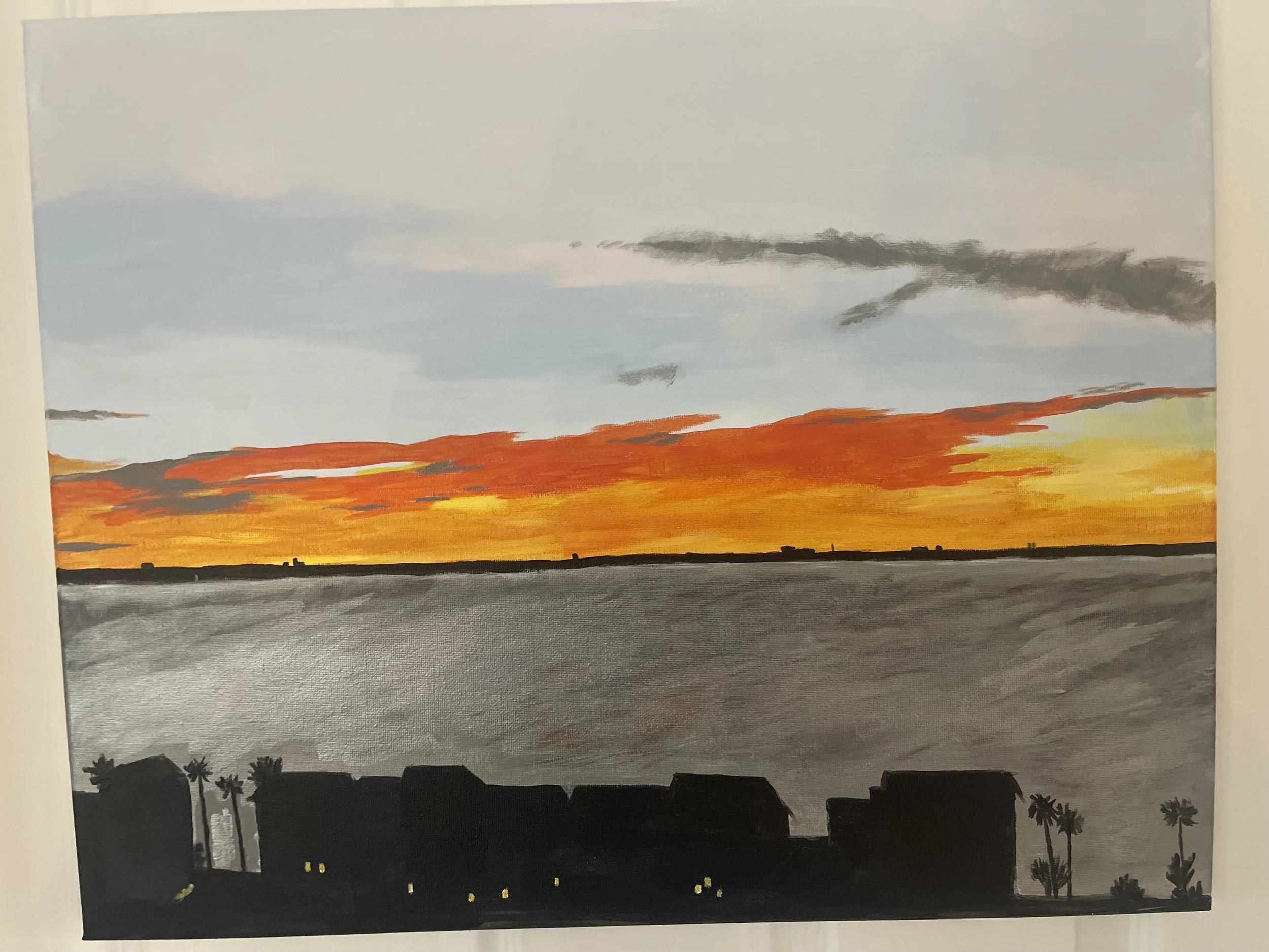 Painting of a sunset over a body of water with silhouettes of houses and palm trees in the foreground.