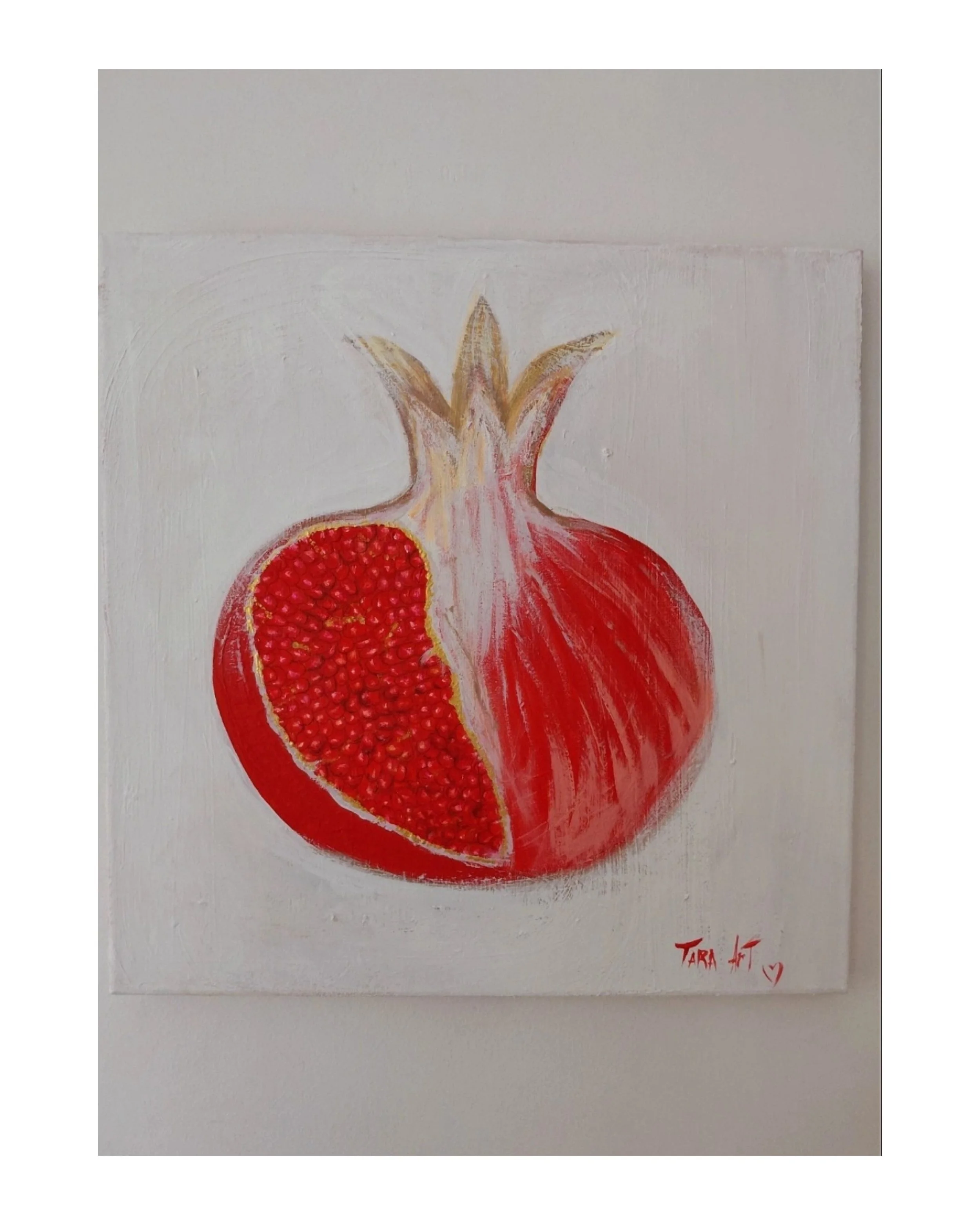 Textured pomegranate artwork with rich red tones and layered paint texture, symbolizing abundance, fertility, and inner power.